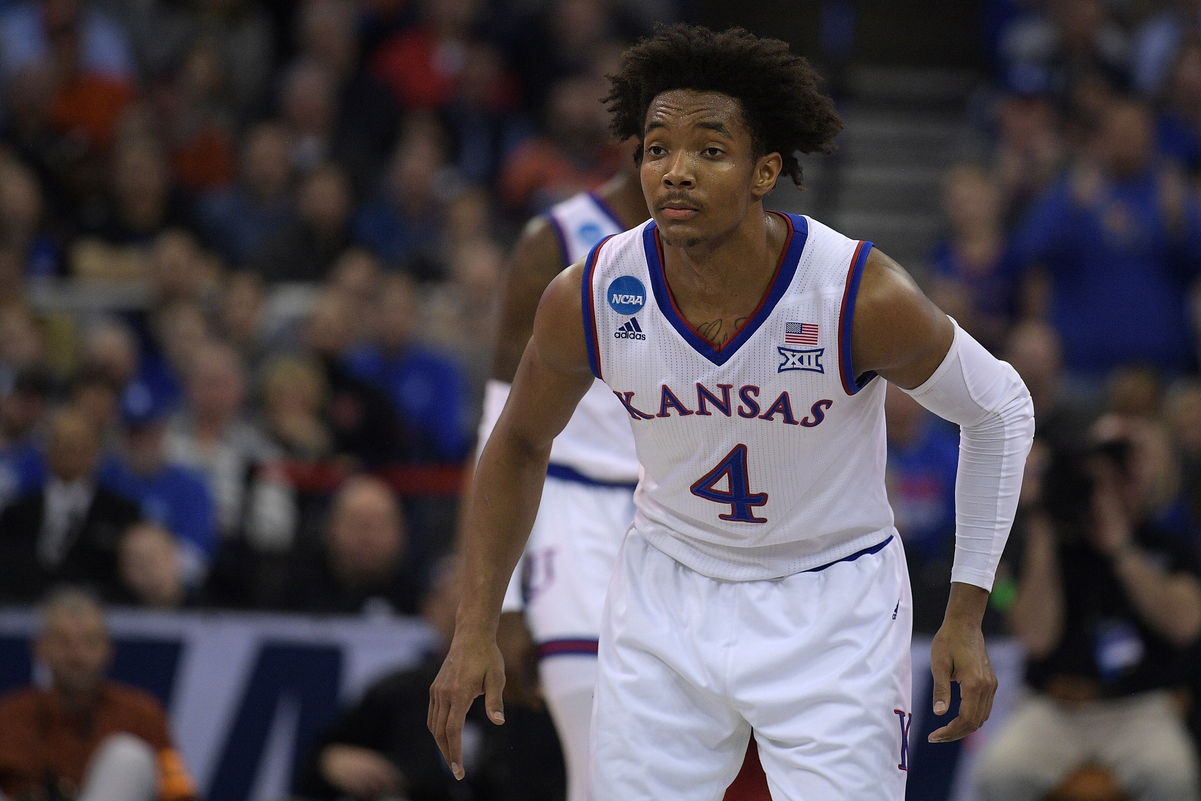 OMAHA, NE - MARCH 23: Devonte' Graham #4 of the Kansas Jayhawks in action against the Clemson Tigers during the 2018 NCAA Men's Basketball Tournament Midwest Regional at CenturyLink Center on March 23, 2018 in Omaha, Nebraska. (Photo by Lance King/Getty I