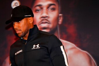 Britain's Anthony Joshua, WBA, IBF and IBO world heavyweight boxing champion, attends a press conference in central London on January 16, 2018 to promote his March 31 world heavyweight unification bout against New Zealand's Joseph Parker, WBO world heavyw