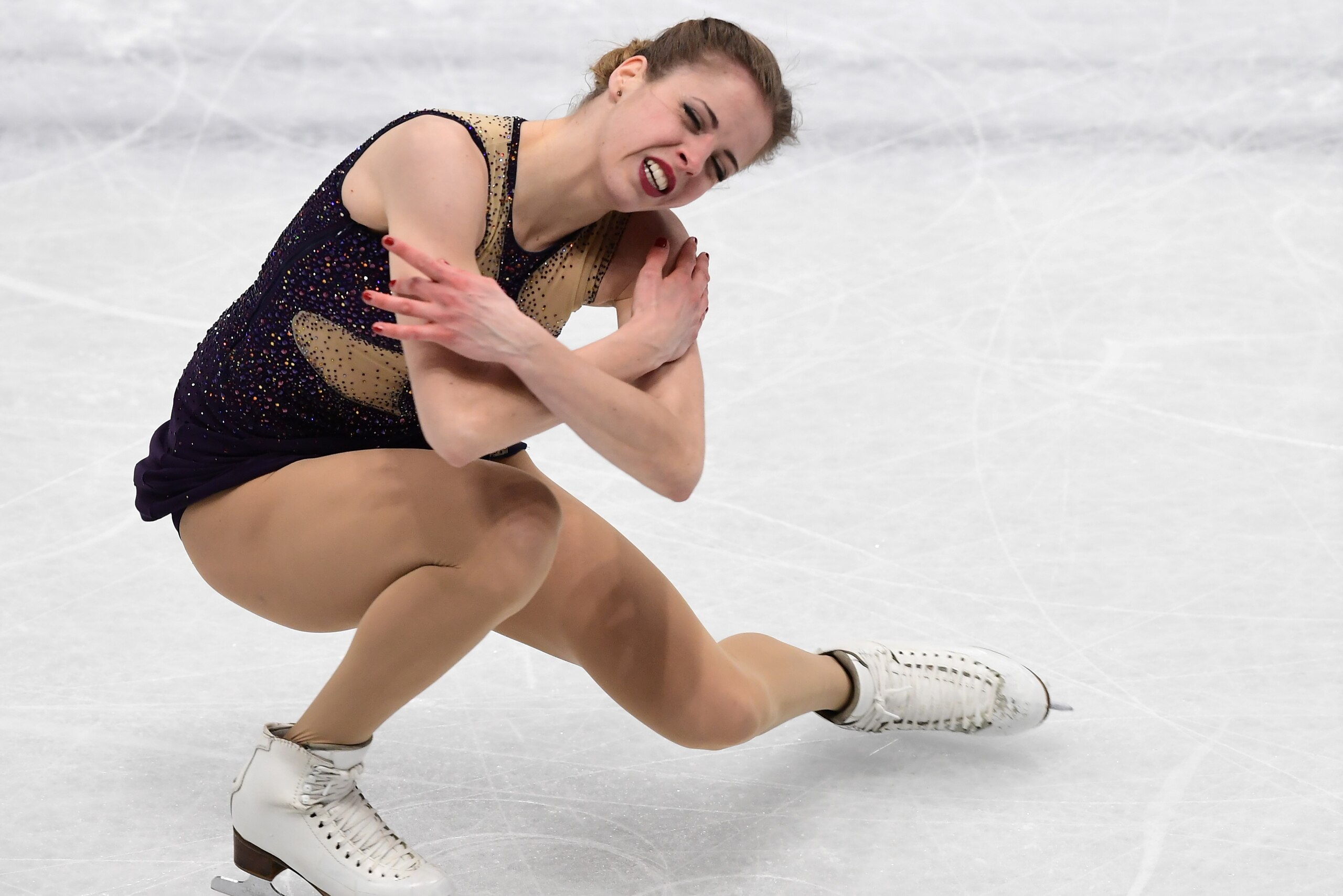 Carolina Kostner from Italy performs on March 23, 2018 during the Ladies-Free Skate program at the Milano World Figure Skating Championship 2018. / AFP PHOTO / MIGUEL MEDINA        (Photo credit should read MIGUEL MEDINA/AFP/Getty Images)