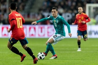 DUESSELDORF, GERMANY - MARCH 23:  Mesut Oezil of Germany runs with the ball during the international friendly match between Germany and Spain at Esprit-Arena on March 23, 2018 in Duesseldorf, Germany. (Photo by Boris Streubel/Getty Images)