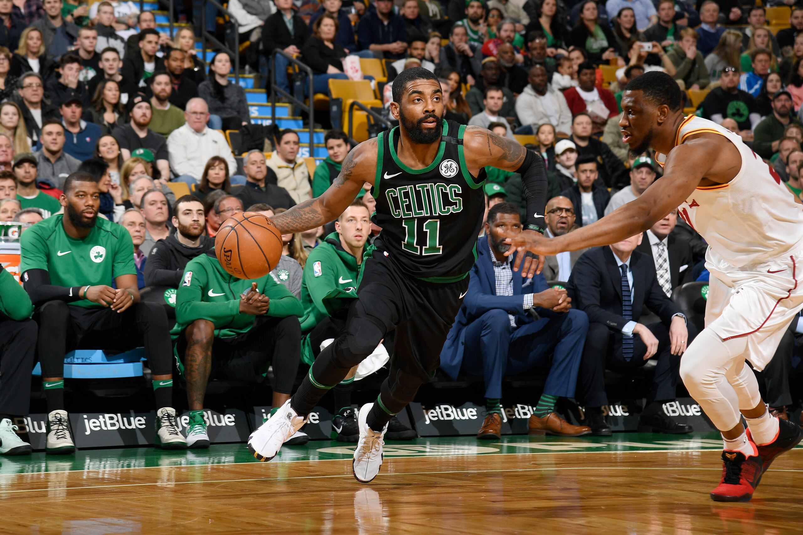BOSTON, MA - MARCH 11: Kyrie Irving #11 of the Boston Celtics handles the ball against the Indiana Pacers on March 11, 2018 at the TD Garden in Boston, Massachusetts. NOTE TO USER: User expressly acknowledges and agrees that, by downloading and or using t