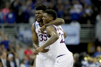 OMAHA, NE - MARCH 25:  Udoka Azubuike #35 and Silvio De Sousa #22 of the Kansas Jayhawks celebrate after defeating the Duke Blue Devils with a score of 81 to 85 in the 2018 NCAA Men's Basketball Tournament Midwest Regional at CenturyLink Center on March 2