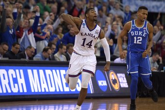 OMAHA, NE - MARCH 25: Malik Newman #14 of the Kansas Jayhawks reacts following a basket during their game against the Duke Blue Devils during the 2018 NCAA Men's Basketball Tournament Midwest Regional Final at CenturyLink Center on March 25, 2018 in Omaha