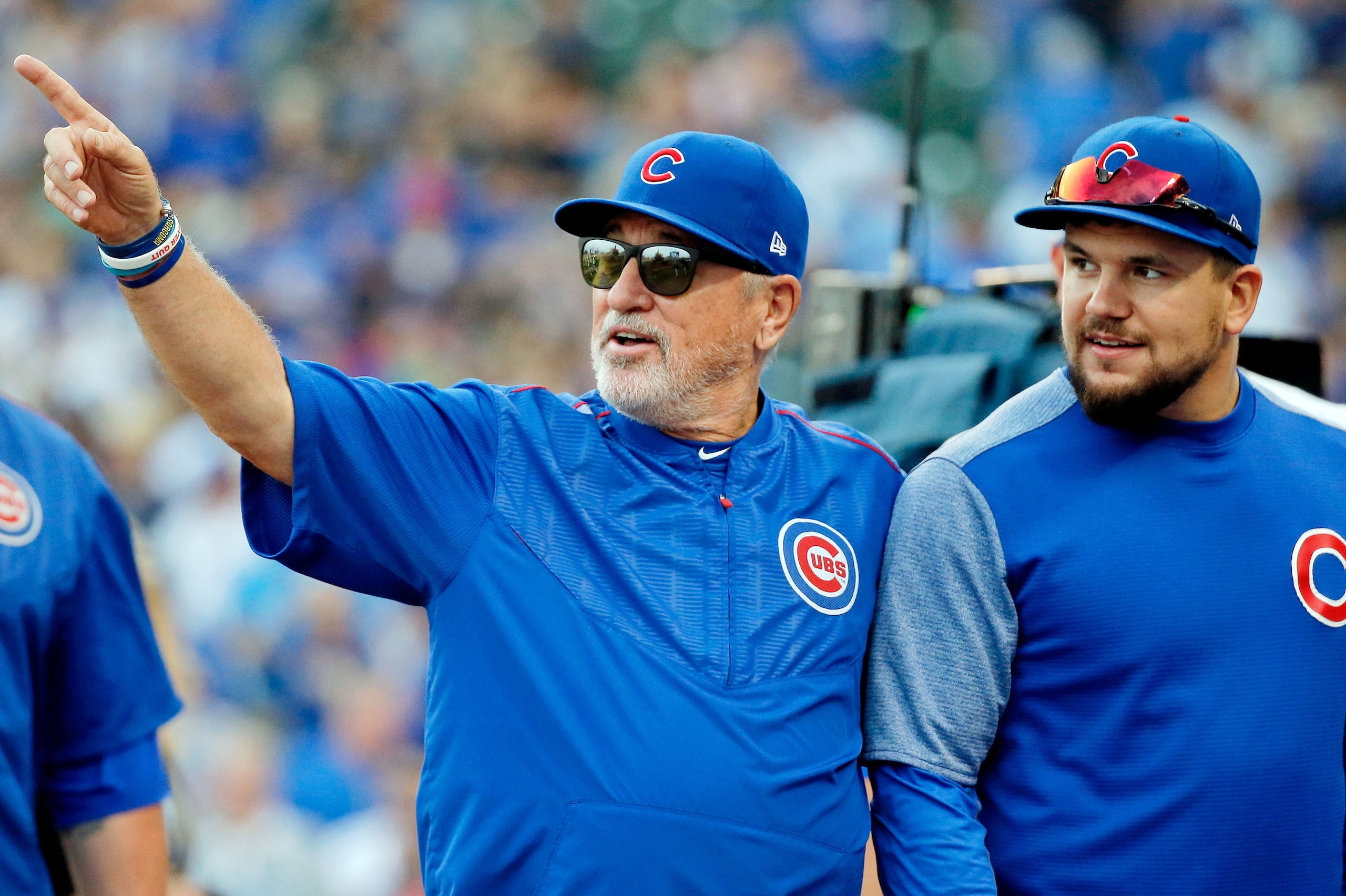 CHICAGO, IL - SEPTEMBER 17: Manager Joe Maddon #70 (L) talks with Kyle Schwarber #12 after their game against the St. Louis Cardinals at Wrigley Field on September 17, 2017 in Chicago, Illinois. The Chicago Cubs won 4-3. (Photo by Jon Durr/Getty Images) CHICAGO, IL - SEPTEMBER 17: Manager Joe Maddon #70 (L) talks with Kyle Schwarber #12 after their game against the St. Louis Cardinals at Wrigley Field on September 17, 2017 in Chicago, Illinois. The Chicago Cubs won 4-3. (Photo by Jon Durr/Getty Images)