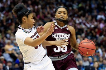 DALLAS, TX - APRIL 02:  Victoria Vivians #35 of the Mississippi State Lady Bulldogs is defended by Tyasha Harris #52 of the South Carolina Gamecocks during the second half of the championship game of the 2017 NCAA Women's Final Four at American Airlines C
