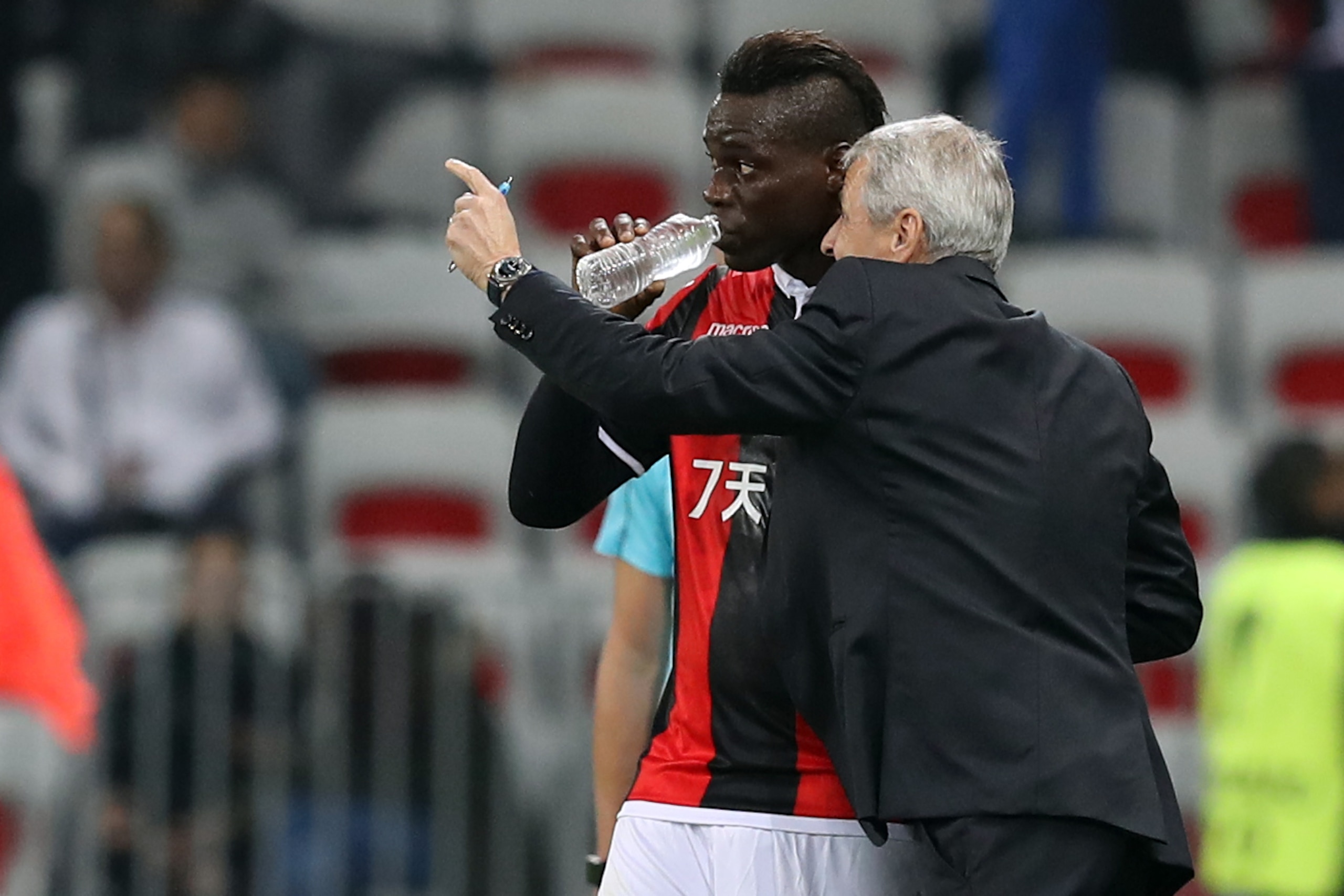 Nice's Italian forward Mario Balotelli (L) listens to Nice's Swiss head coach Lucien Favre after scoring a goal during the UEFA Europa League football match between OGC Nice vs Zulte Waregem on November 23, 2017 at the 'Allianz Riviera Stadium' in Nice, s Nice's Italian forward Mario Balotelli (L) listens to Nice's Swiss head coach Lucien Favre after scoring a goal during the UEFA Europa League football match between OGC Nice vs Zulte Waregem on November 23, 2017 at the 'Allianz Riviera Stadium' in Nice, s