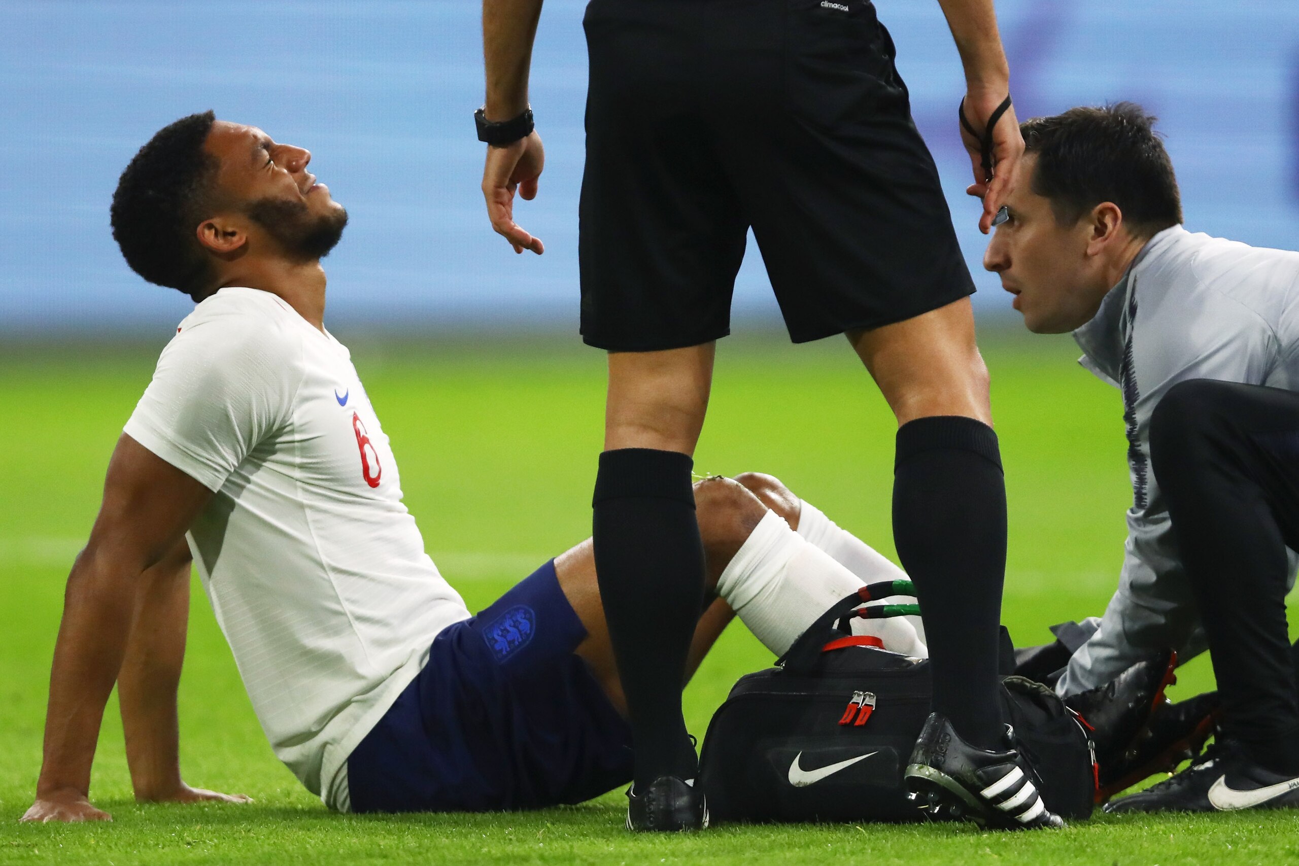 AMSTERDAM, NETHERLANDS - MARCH 23:  Joe Gomez of England is given treatment during the international friendly match between Netherlands and England at Johan Cruyff Arena on March 23, 2018 in Amsterdam, Netherlands.  (Photo by Dean Mouhtaropoulos/Getty Ima