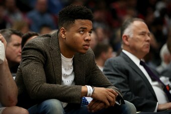 CHICAGO, IL - FEBRUARY 22:  Markelle Fultz #20 of the Philadelphia 76ers looks on from the bench in the second quarter against the Chicago Bulls at the United Center on February 22, 2018 in Chicago, Illinois. NOTE TO USER: User expressly acknowledges and 