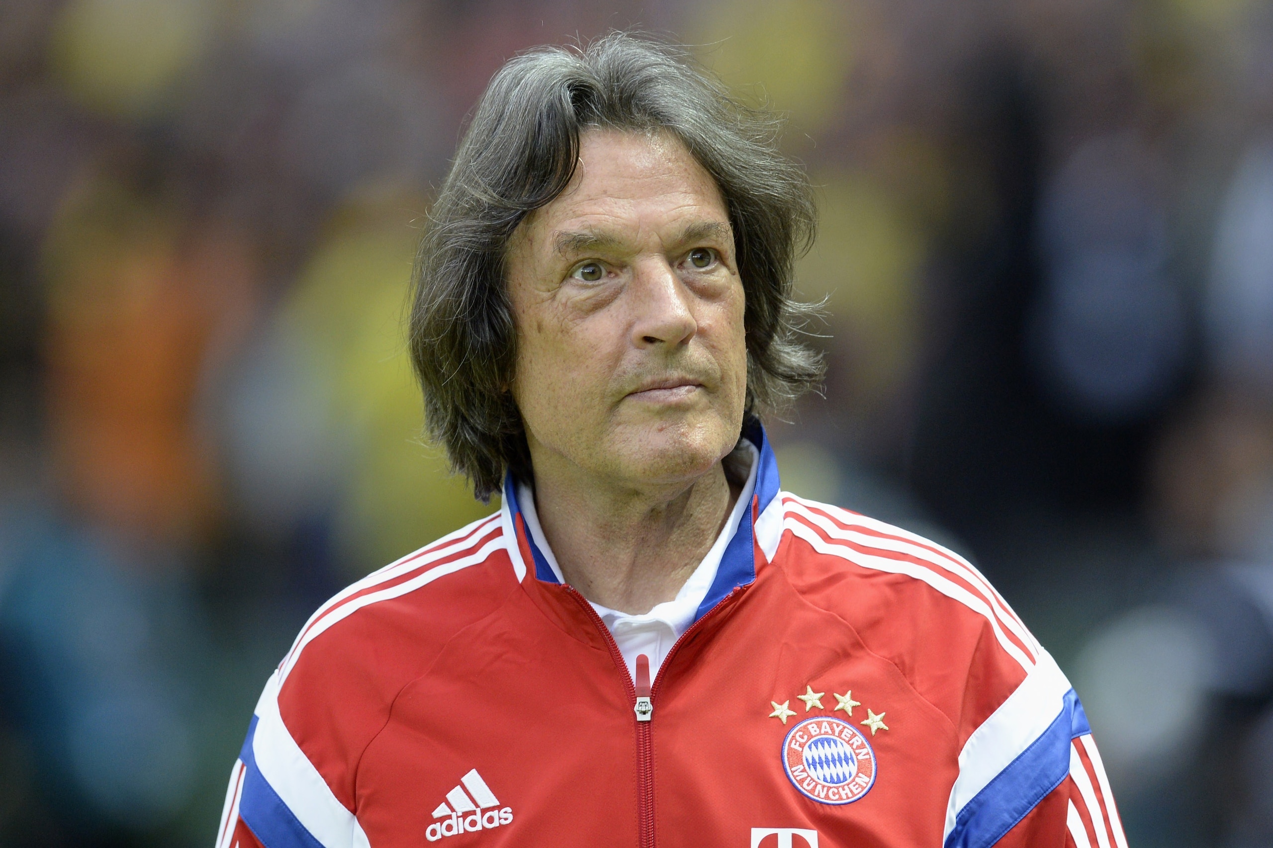Bayern Munich's Doctor Hans-Wilhelm Mueller-Wohlfahrt looks on ahead the DFB German Cup final football match BVB Borussia Dortmund vs Bayern Munich at the Olympic Stadium in Berlin on May 17, 2014.  AFP PHOTO / CHRISTOF STACHE        (Photo credit should 