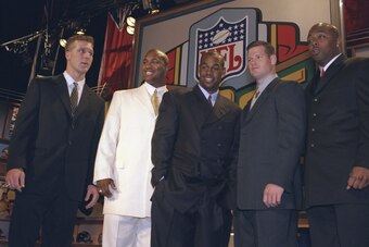 17 Apr 1999:  Quarterbacks Tim Couch, Daunte Culpepper, Donovan McNabb, Cade McNown, and  Akili Smith pose for a picture during the NFL Draft at the Madison Square Garden in New York, New York. Mandatory Credit: Ezra O. Shaw  /Allsport