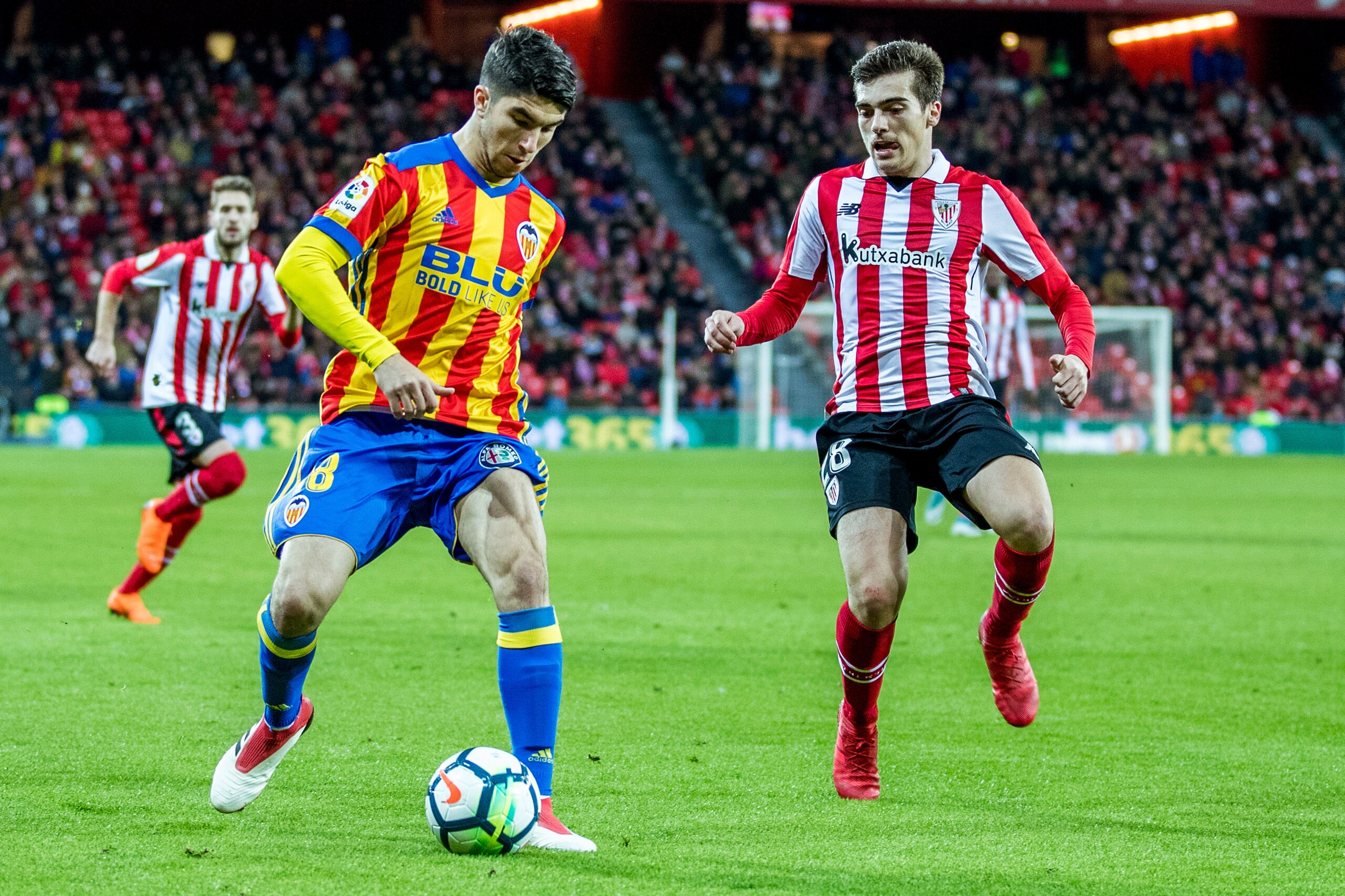 BILBAO, SPAIN - FEBRUARY 28: (L-R) Carlos Soler of Valencia CF, Inigo Cordoba of Athletic Bilbao  during the La Liga Santander  match between Athletic de Bilbao v Valencia at the Estadio San Mames on February 28, 2018 in Bilbao Spain (Photo by David S. Bu