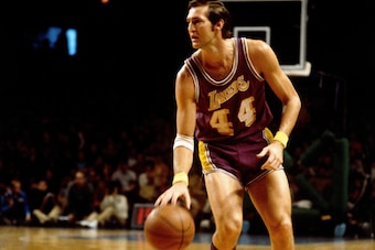 MILWAUKEE - 1972:  Jerry West #44 of the Los Angeles Lakers moves the ball up court during a game against the Milwaukee Bucks during the 1972 season at the MECCA Arena in Milwaukee, Wisconsin. NOTE TO USER: User expressly acknowledges that, by downloading