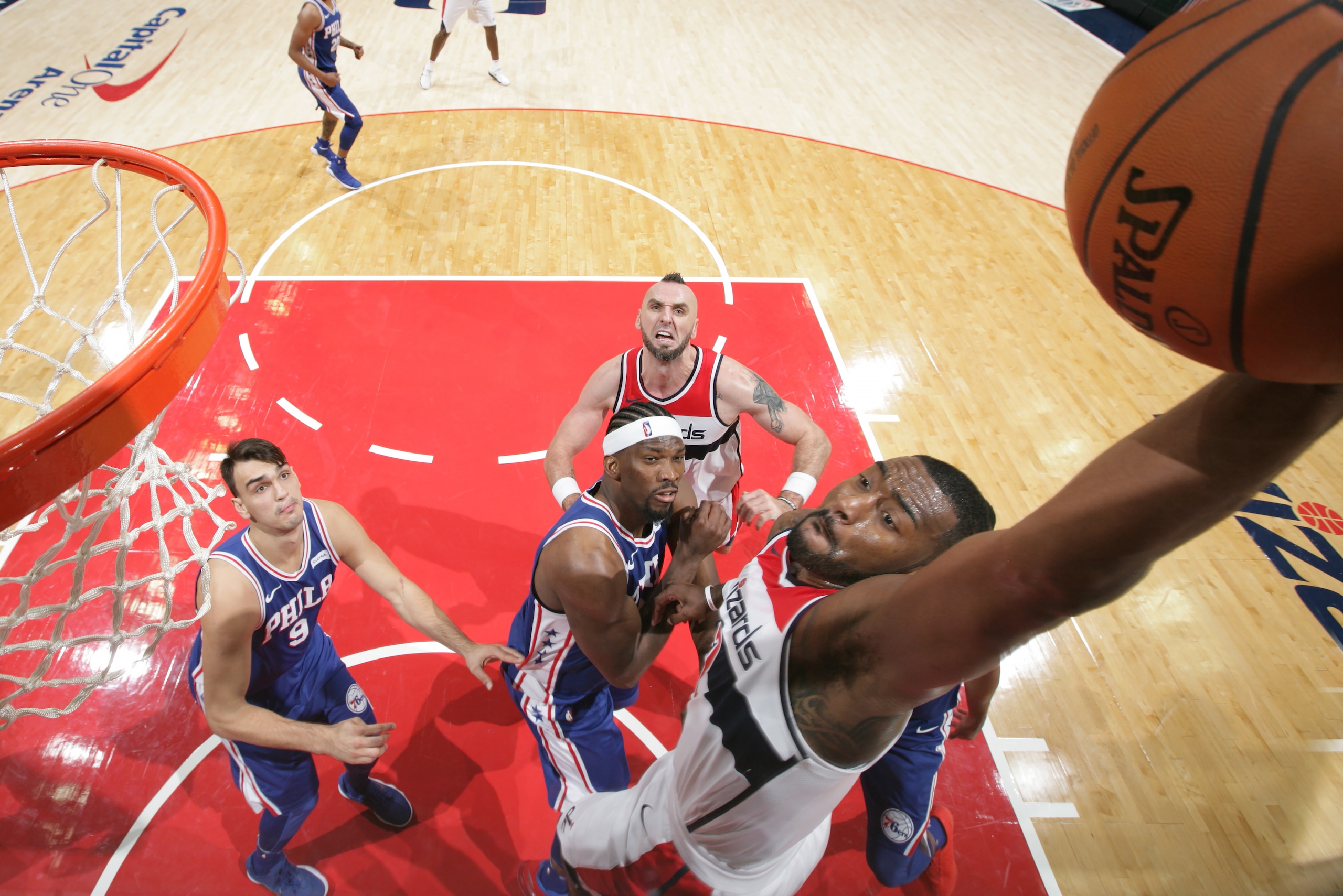 WASHINGTON, DC -  OCTOBER 18:  John Wall #2 of the Washington Wizards dunks the ball against the Philadelphia 76ers on October 18, 2017 at Capital One Arena in Washington, DC. NOTE TO USER: User expressly acknowledges and agrees that, by downloading and o
