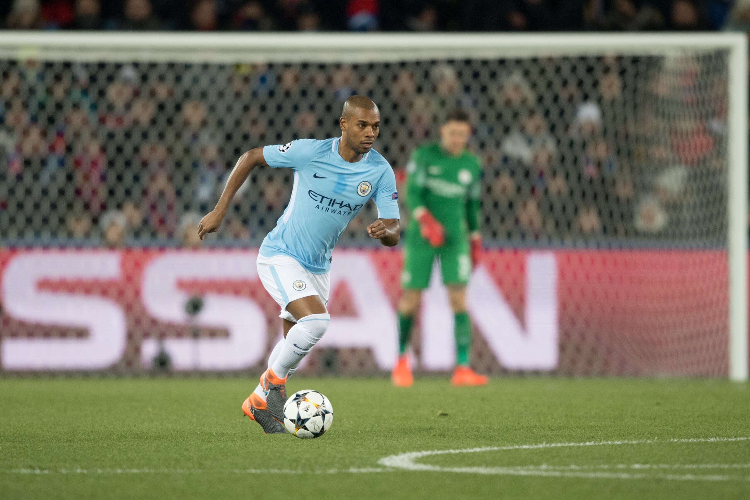 BASEL, SWITZERLAND - FEBRUARY 13: Fernandinho of Manchester City controls the ball during the UEFA Champions League Round of 16 First Leg match between FC Basel and Manchester City at St. Jakob-Park on February 13, 2018 in Basel, Switzerland. (Photo by MB