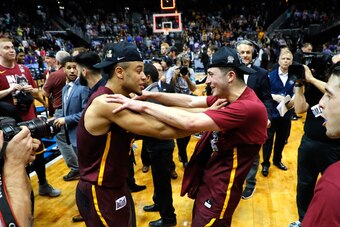 ATLANTA, GA - MARCH 24:  Marques Townes #5 and Ben Richardson #14 of the Loyola Ramblers celebrate after defeating the Kansas State Wildcats during the 2018 NCAA Men's Basketball Tournament South Regional at Philips Arena on March 24, 2018 in Atlanta, Geo