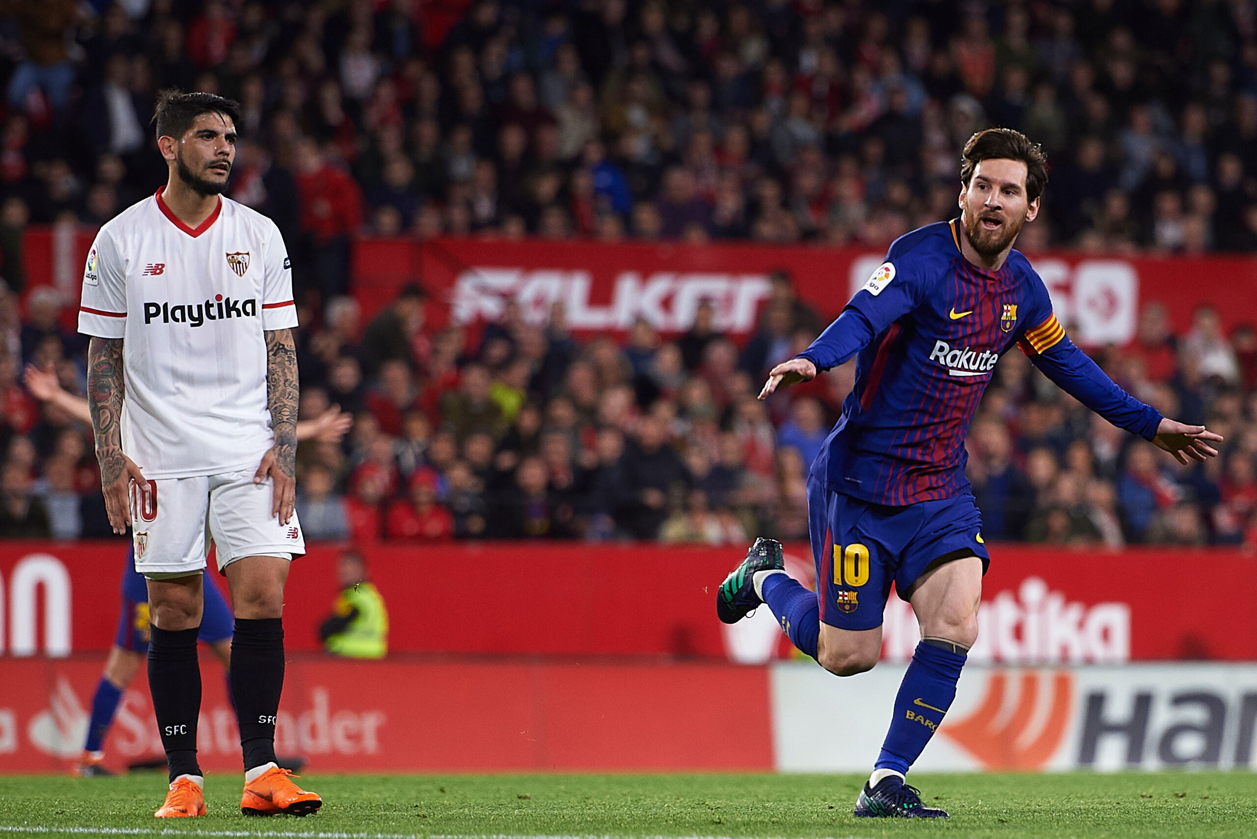 SEVILLE, SPAIN - MARCH 31: Lionel Messi of FC Barcelona celebrates after scoring the second goal of FC Barcelona during the La Liga match between Sevilla CF and FC Barcelona at Estadio Ramon Sanchez Pizjuan on March 31, 2018 in Seville, Spain. (Photo by A