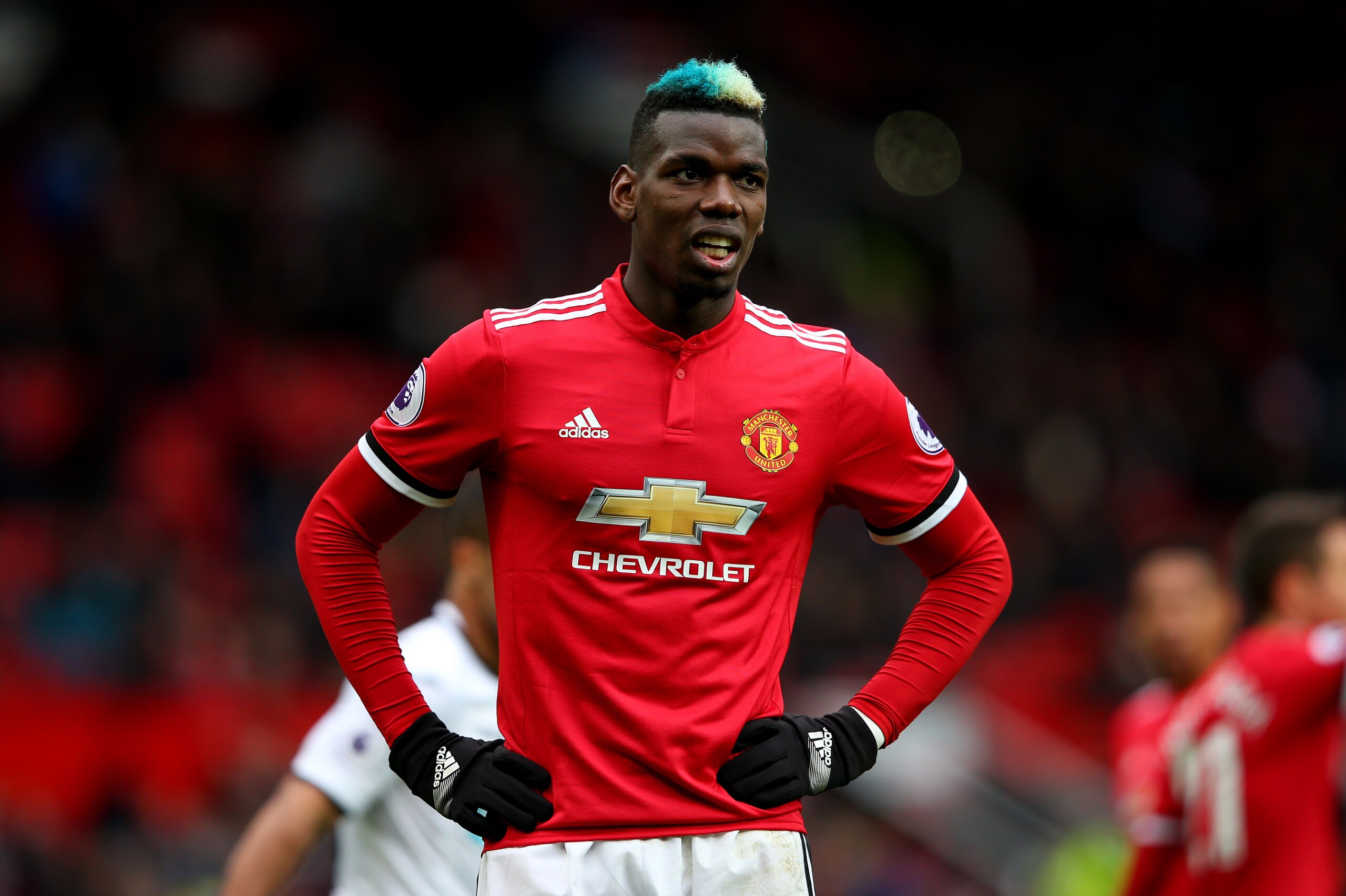 MANCHESTER, ENGLAND - MARCH 31:  Paul Pogba of Manchester United looks on during the Premier League match between Manchester United and Swansea City at Old Trafford on March 31, 2018 in Manchester, England.  (Photo by Alex Livesey/Getty Images)