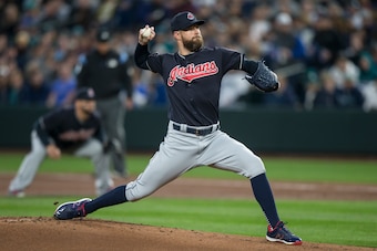 SEATTLE, WA - MARCH 29: Starter Corey Kluber #28 of the Cleveland Indians delivers a pitch during a game against the Seattle Mariners at Safeco Field on March 29, 2018 in Seattle, Washington. The Mariners won the game 2-1. (Photo by Stephen Brashear/Getty