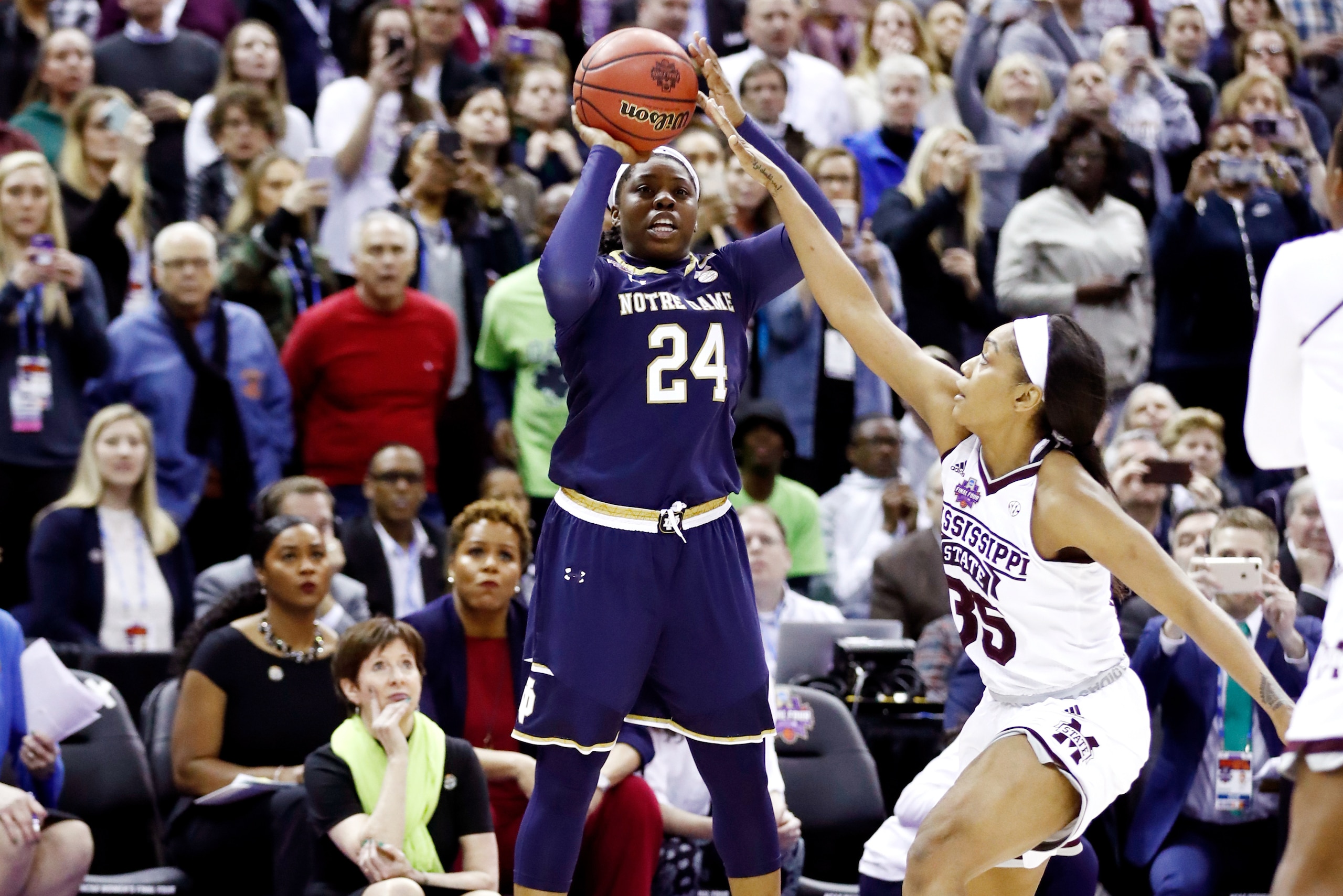 COLUMBUS, OH - APRIL 01: Arike Ogunbowale #24 of the Notre Dame Fighting Irish hits the game winning shot with 0.1 seconds remaining in the fourth quarter under pressure from Victoria Vivians #35 to defeat the Mississippi State Lady Bulldogs 61-58 in the COLUMBUS, OH - APRIL 01: Arike Ogunbowale #24 of the Notre Dame Fighting Irish hits the game winning shot with 0.1 seconds remaining in the fourth quarter under pressure from Victoria Vivians #35 to defeat the Mississippi State Lady Bulldogs 61-58 in the