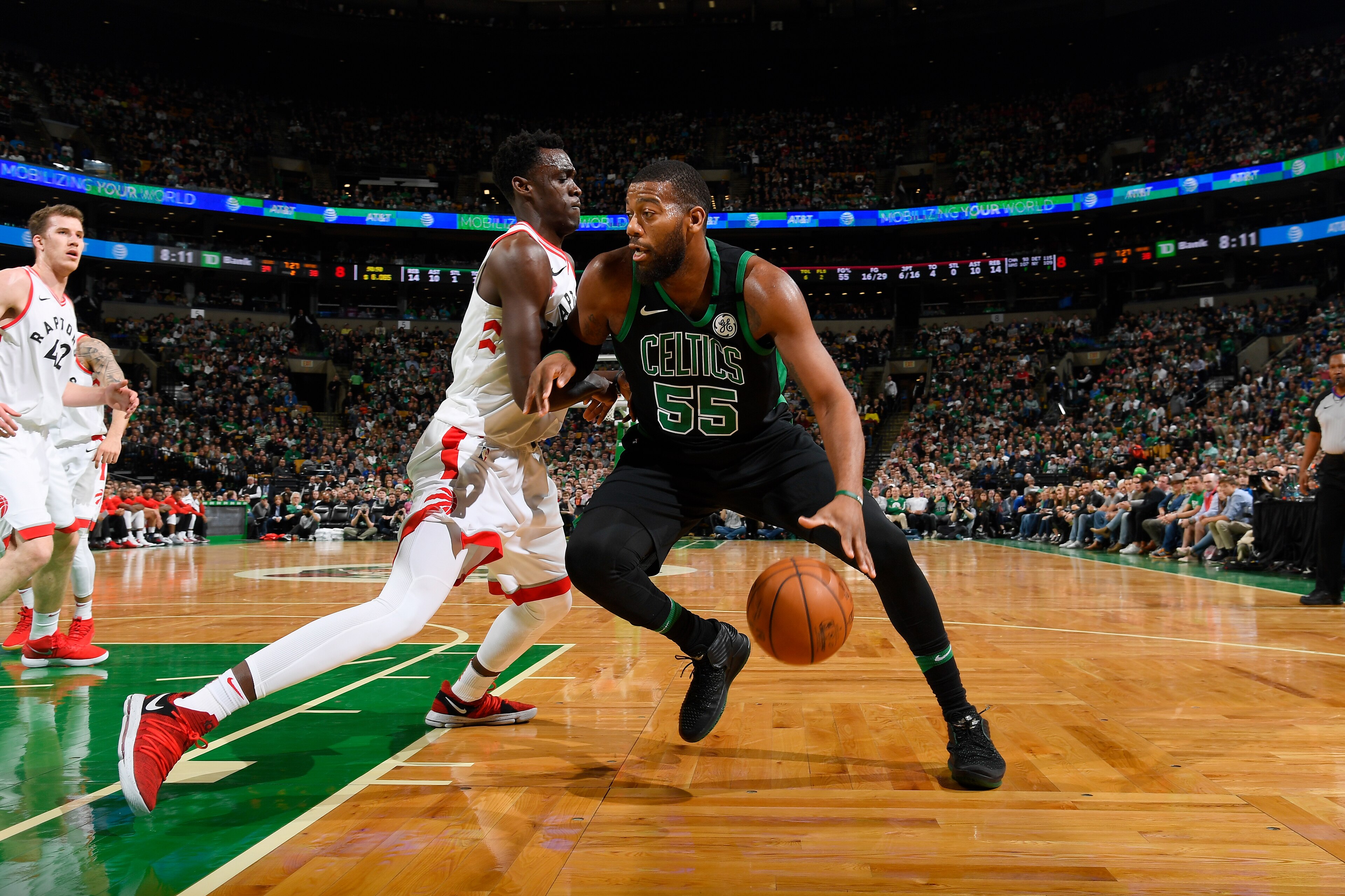 BOSTON, MA - MARCH 31: Greg Monroe #55 of the Boston Celtics handles the ball against the Toronto Raptors on March 31, 2018 at the TD Garden in Boston, Massachusetts. NOTE TO USER: User expressly acknowledges and agrees that, by downloading and or using t BOSTON, MA - MARCH 31: Greg Monroe #55 of the Boston Celtics handles the ball against the Toronto Raptors on March 31, 2018 at the TD Garden in Boston, Massachusetts. NOTE TO USER: User expressly acknowledges and agrees that, by downloading and or using t