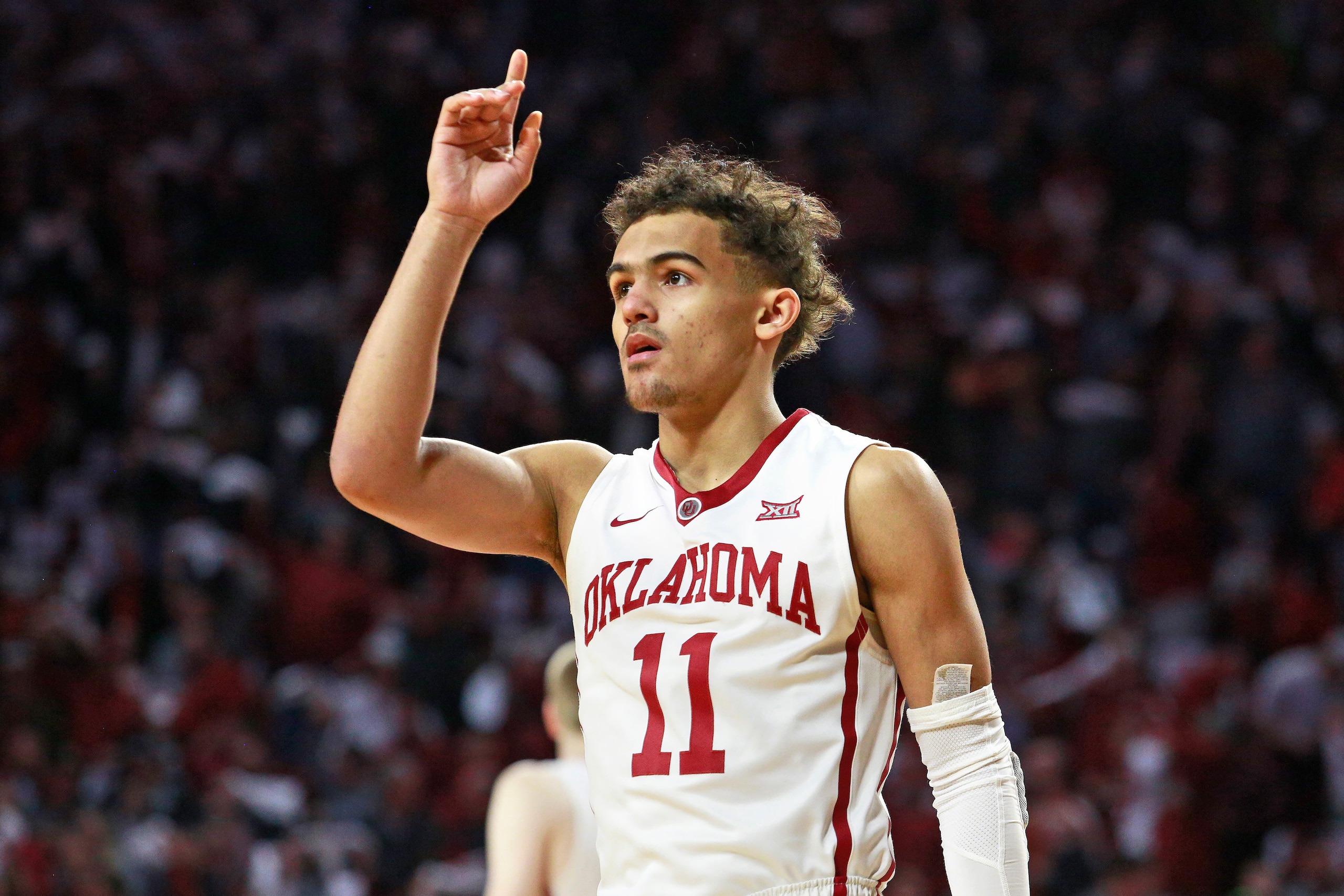 NORMAN, OK - FEBRUARY 17: Trae Young #11 of the Oklahoma Sooners takes to the court before the game against the Texas Longhorns at Lloyd Noble Center on February 24, 2018 in Norman, Oklahoma. The Longhorns defeated the Sooners 77-66. (Photo by Brett Deeri