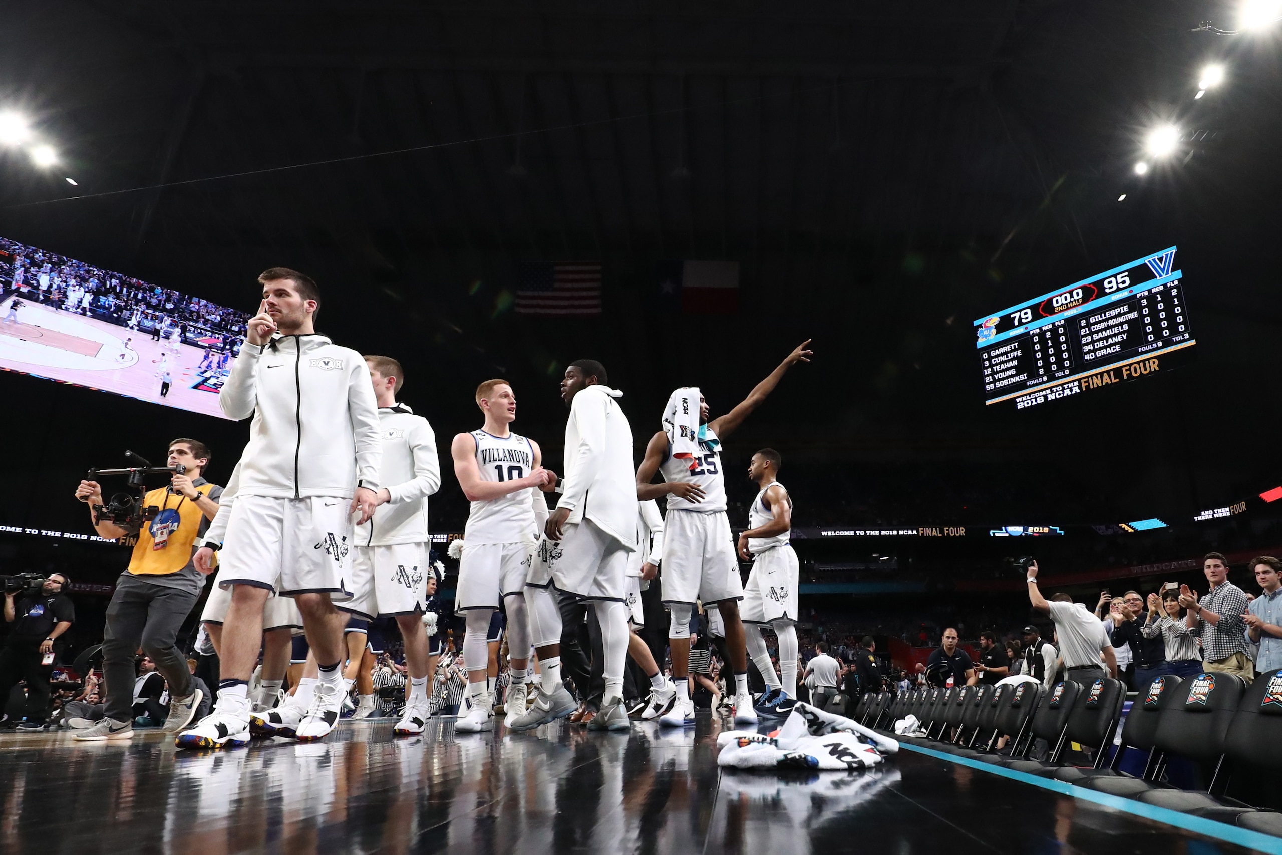 SAN ANTONIO, TX - MARCH 31: The Villanova Wildcats celebrate their win over the Kansas Jayhawks during the 2018 NCAA Men's Final Four Semifinal at the Alamodome on March 31, 2018 in San Antonio, Texas. The Villanova Wildcats defeated the Kansas Jayhawks 9