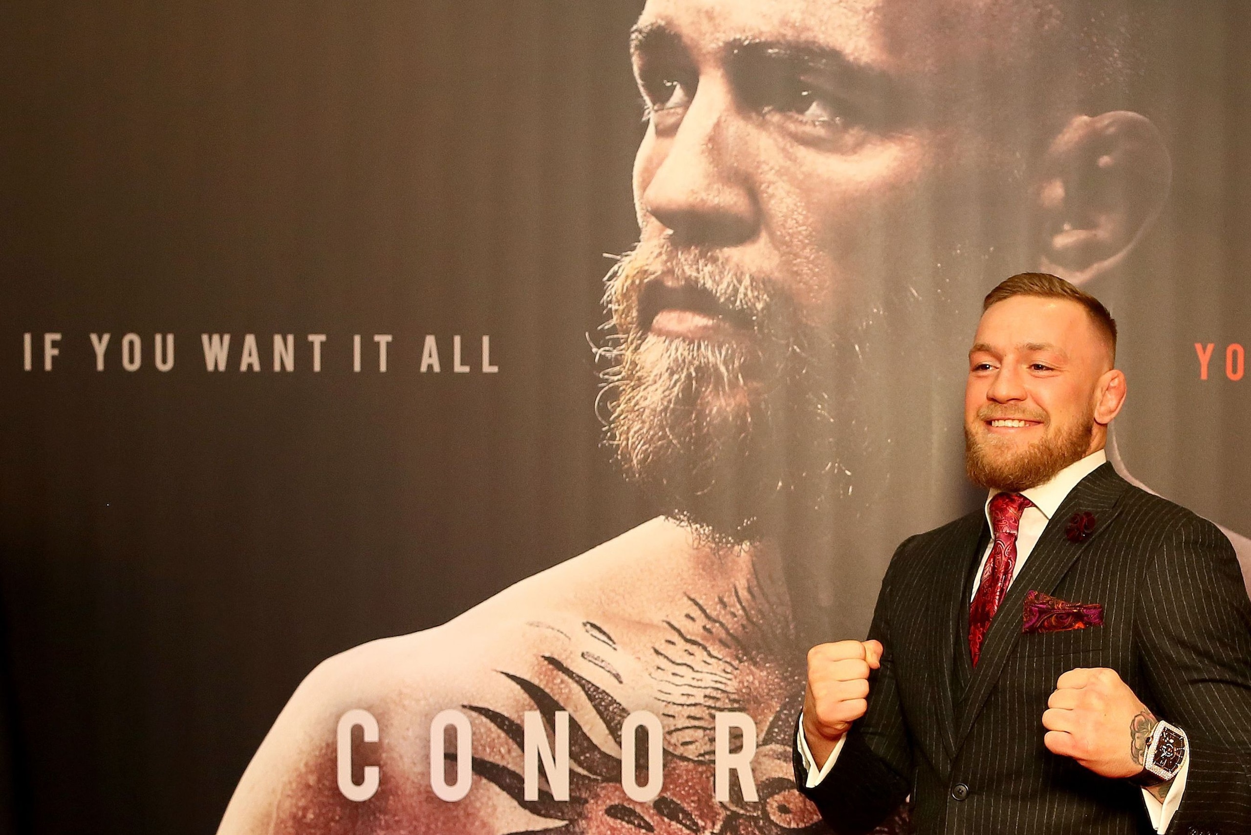 Irish mixed martial arts star Conor McGregor poses upon arrival to attend the world premiere of the documentary film 'Conor McGregor: Notorious' at the Savoy Cinema in Dublin, Ireland on November 1, 2017. / AFP PHOTO / Paul FAITH        (Photo credit shou
