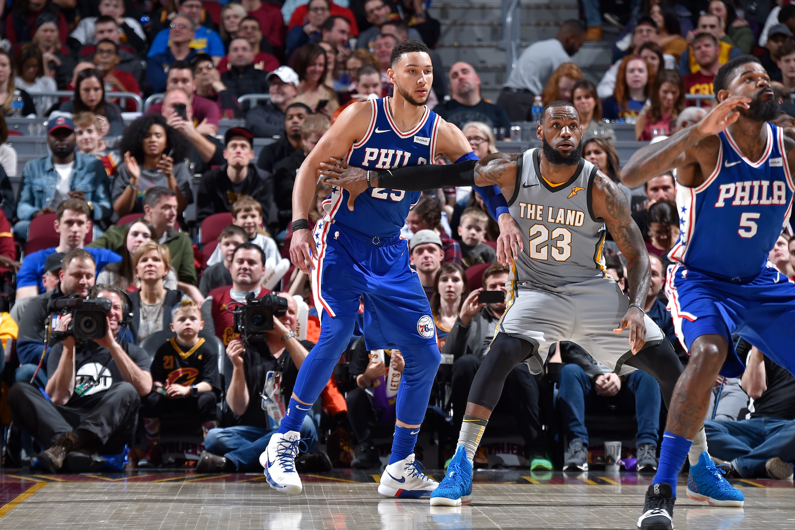 CLEVELAND, OH - MARCH 1: LeBron James #23 of the Cleveland Cavaliers guards Ben Simmons #25 of the Philadelphia 76ers on March 1, 2018 at Quicken Loans Arena in Cleveland, Ohio. NOTE TO USER: User expressly acknowledges and agrees that, by downloading and