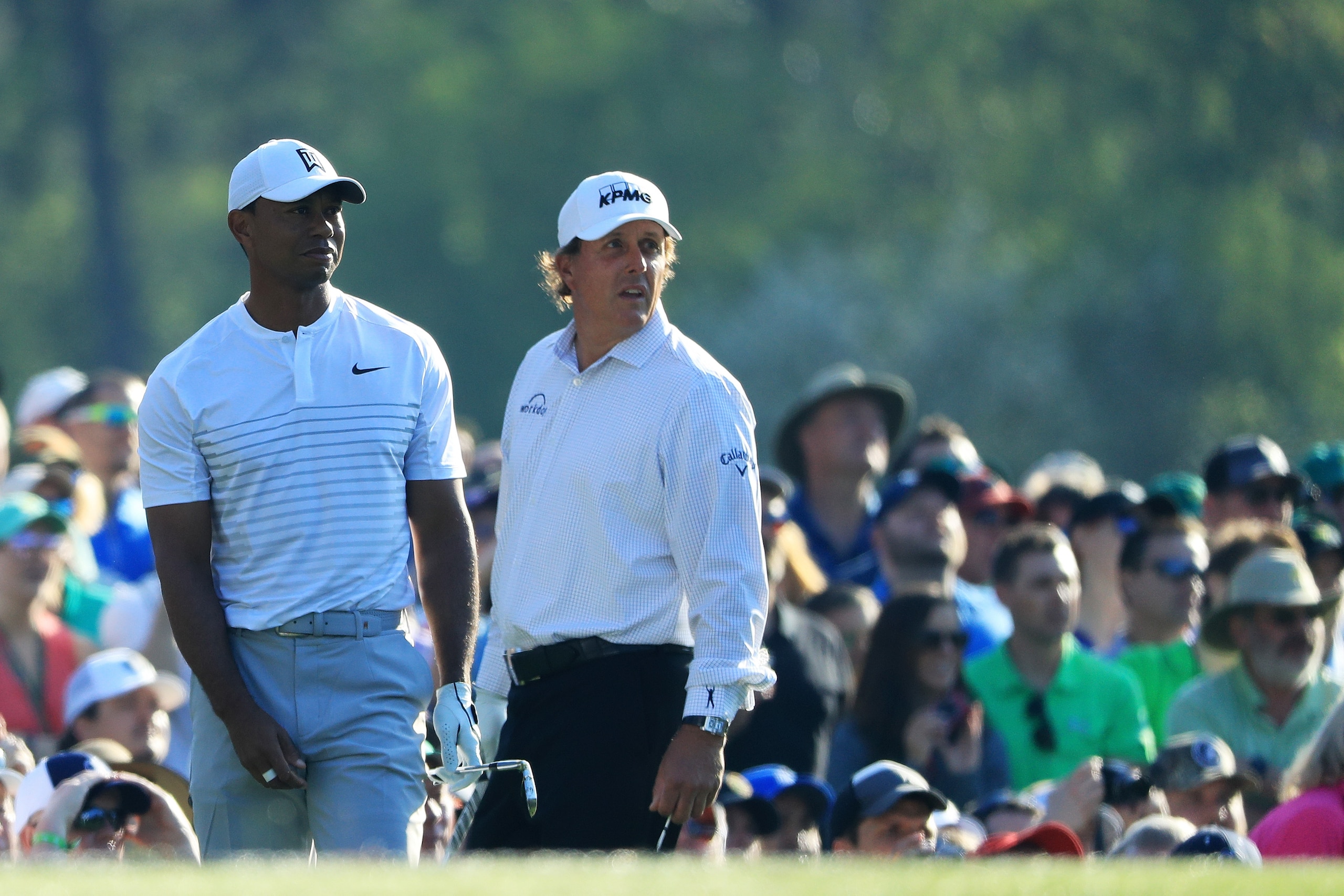 AUGUSTA, GA - APRIL 03: Tiger Woods and Phil Mickelson of the United States look on from the 12th tee during a practice round prior to the start of the 2018 Masters Tournament at Augusta National Golf Club on April 3, 2018 in Augusta, Georgia. (Photo by AUGUSTA, GA - APRIL 03: Tiger Woods and Phil Mickelson of the United States look on from the 12th tee during a practice round prior to the start of the 2018 Masters Tournament at Augusta National Golf Club on April 3, 2018 in Augusta, Georgia. (Photo by