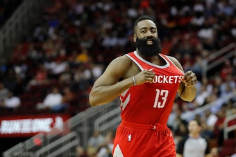 HOUSTON, TX - APRIL 03:  James Harden #13 of the Houston Rockets celebrates after a three-point shot in the second half against the Washington Wizards at Toyota Center on April 3, 2018 in Houston, Texas.  NOTE TO USER: User expressly acknowledges and agre