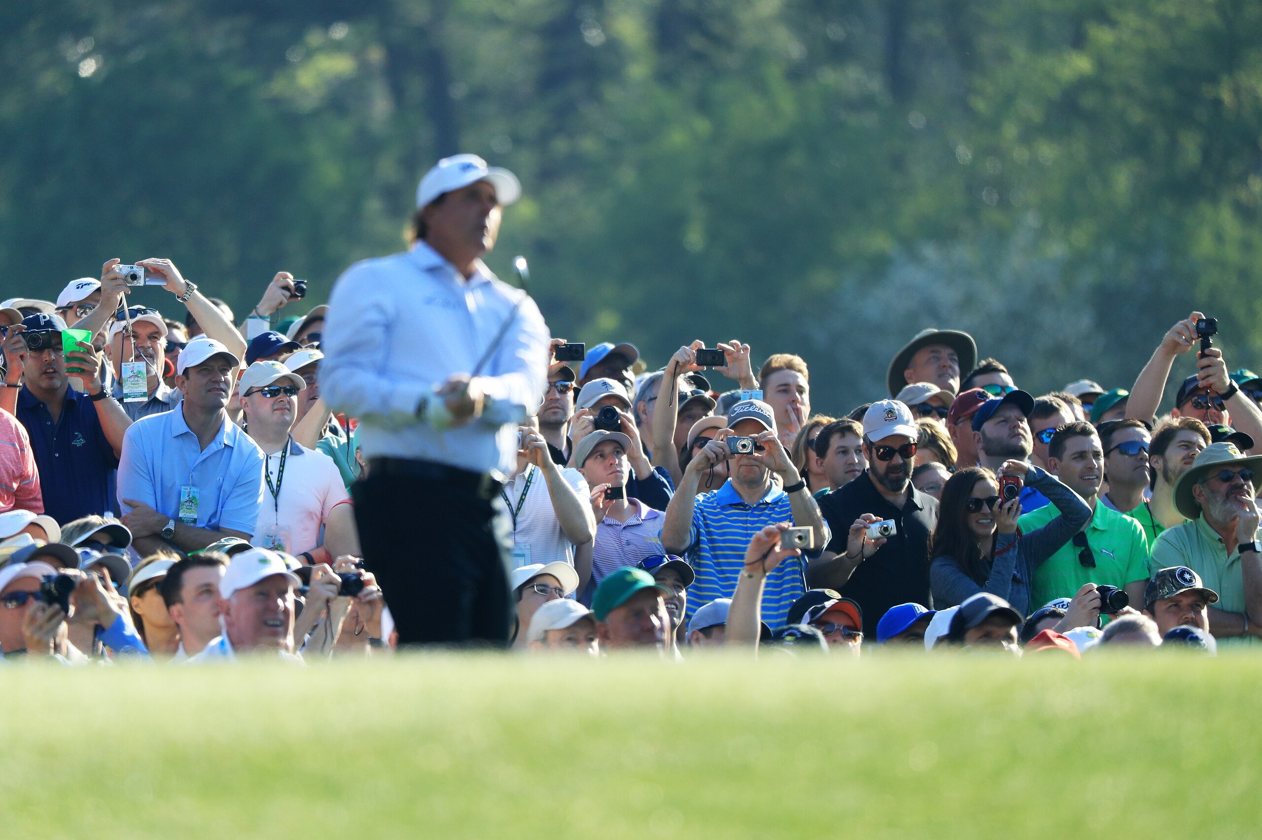 AUGUSTA, GA - APRIL 03:  Phil Mickelson of the United States plays his shot from the 12th tee during a practice round prior to the start of the 2018 Masters Tournament at Augusta National Golf Club on April 3, 2018 in Augusta, Georgia.  (Photo by Andrew R