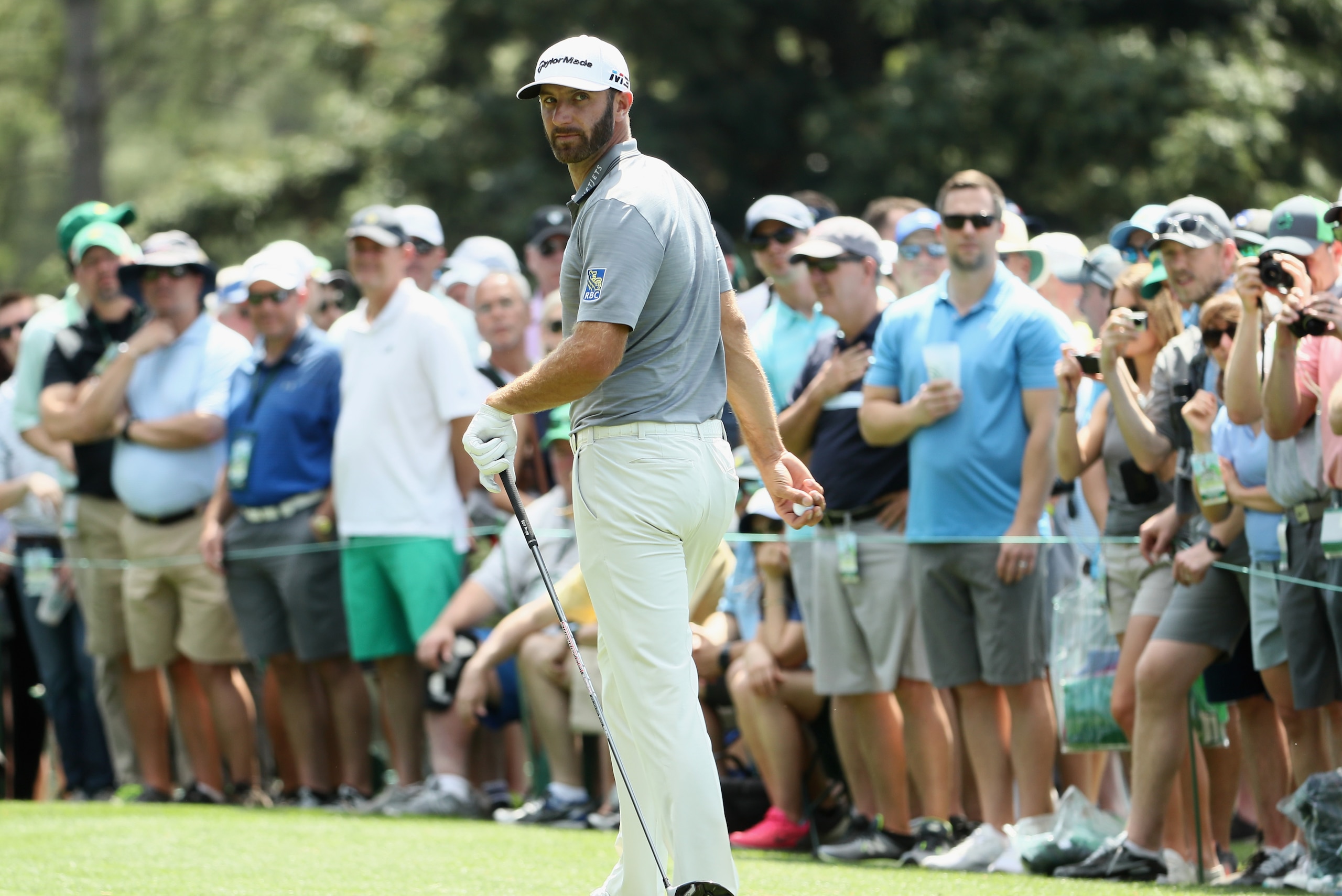 AUGUSTA, GA - APRIL 03: Dustin Johnson of the United States looks on during a practice round prior to the start of the 2018 Masters Tournament at Augusta National Golf Club on April 3, 2018 in Augusta, Georgia. (Photo by Jamie Squire/Getty Images) AUGUSTA, GA - APRIL 03: Dustin Johnson of the United States looks on during a practice round prior to the start of the 2018 Masters Tournament at Augusta National Golf Club on April 3, 2018 in Augusta, Georgia. (Photo by Jamie Squire/Getty Images)