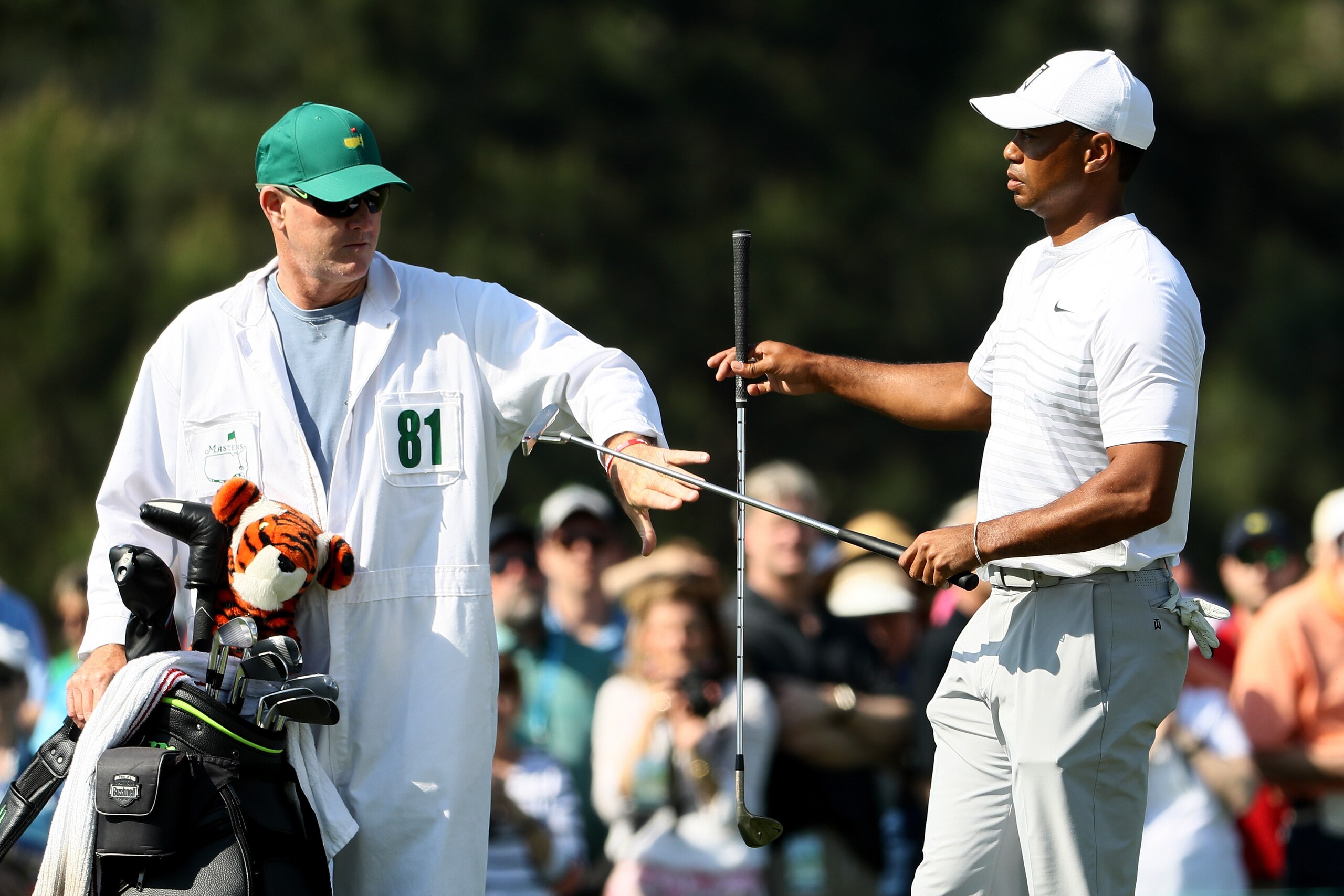 AUGUSTA, GA - APRIL 03: Tiger Woods of the United States and caddie Joe LaCava change clubls during a practice round prior to the start of the 2018 Masters Tournament at Augusta National Golf Club on April 3, 2018 in Augusta, Georgia. (Photo by Jamie Sq AUGUSTA, GA - APRIL 03: Tiger Woods of the United States and caddie Joe LaCava change clubls during a practice round prior to the start of the 2018 Masters Tournament at Augusta National Golf Club on April 3, 2018 in Augusta, Georgia. (Photo by Jamie Sq