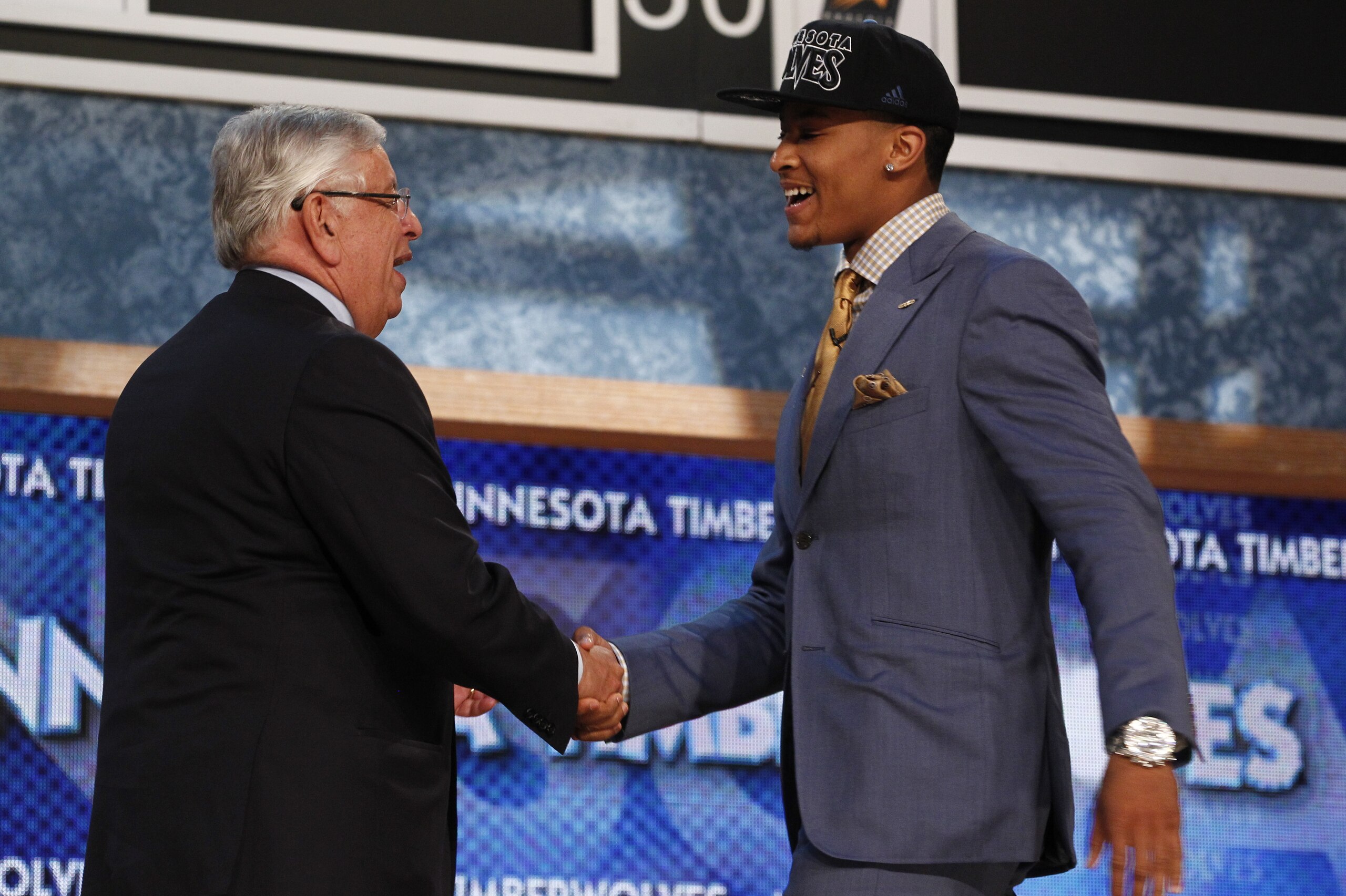NEW YORK, NY - JUNE 27: NBA Commissioner David Stern shakes hands with Trey Burke, who is drafted number 9 overall by the Minnesota Timberwolves during the 2013 NBA Draft at the Barclays Center on June 27, 2013 in the Brooklyn borough of New York City. NO