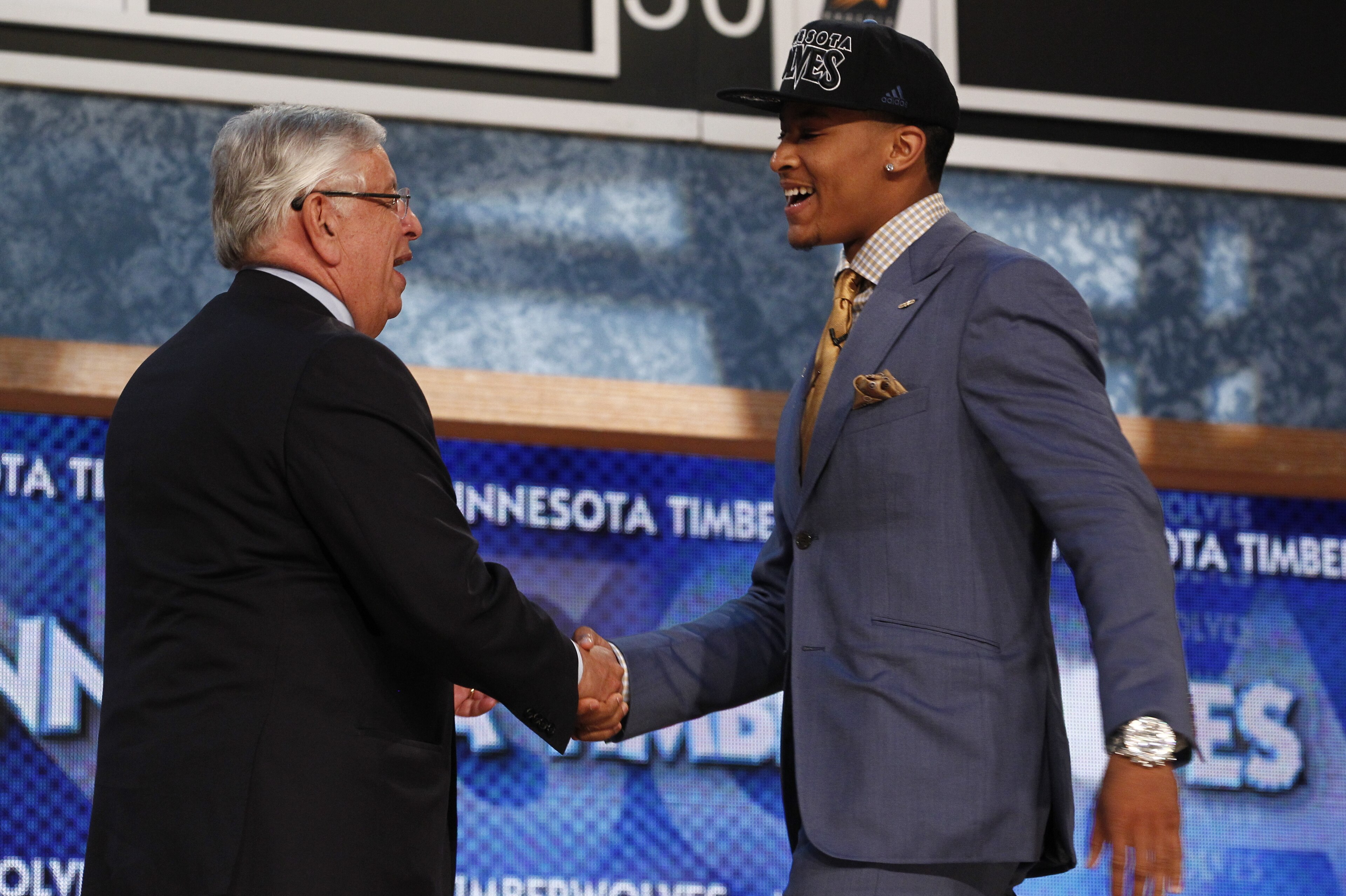 NEW YORK, NY - JUNE 27: NBA Commissioner David Stern shakes hands with Trey Burke, who is drafted number 9 overall by the Minnesota Timberwolves during the 2013 NBA Draft at the Barclays Center on June 27, 2013 in the Brooklyn borough of New York City. NO