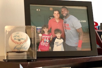 The baseball David Ortiz autographed for Julius Genachowski and his family.
