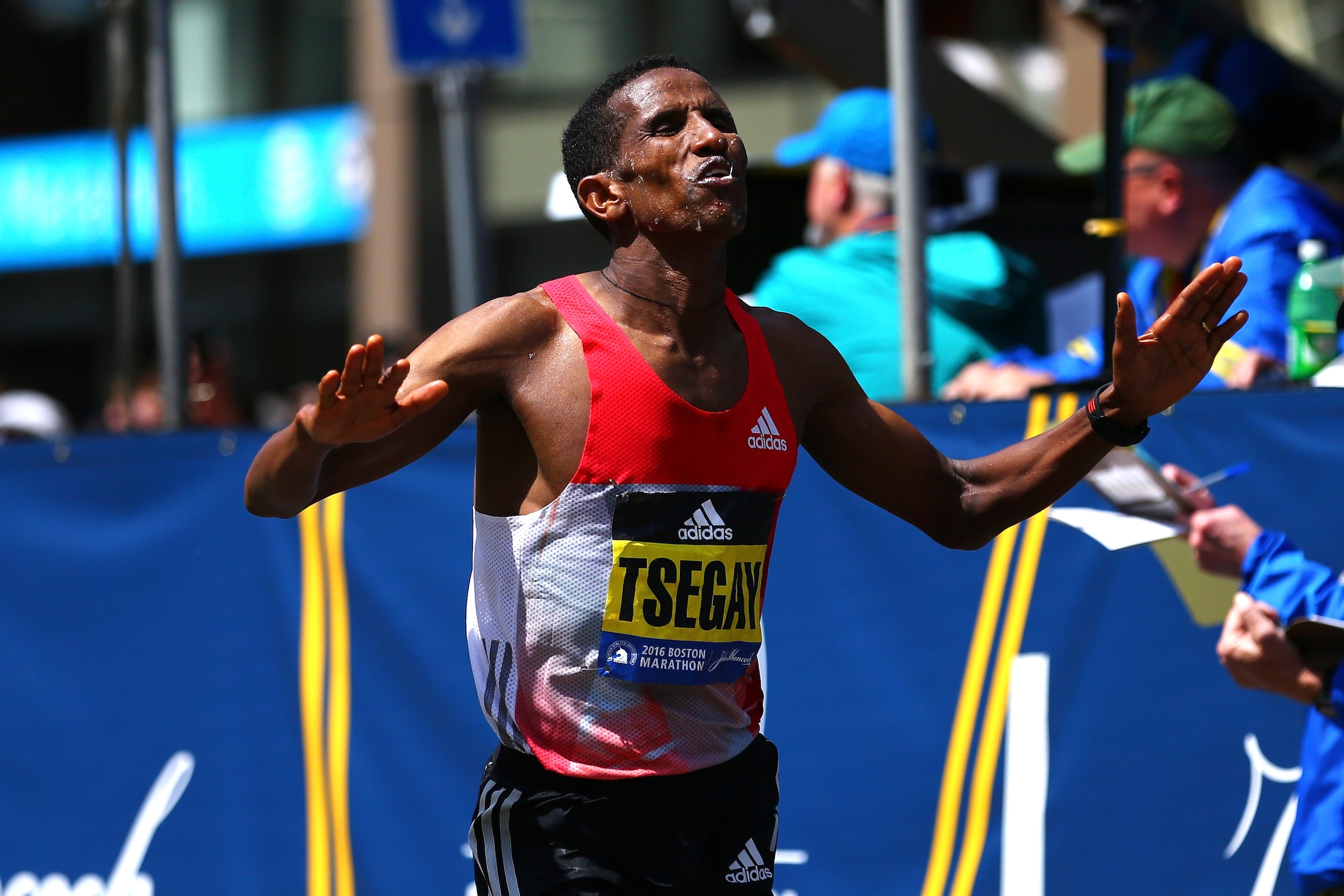 BOSTON, MA - APRIL 18: Yemane Adhane Tsegay of Ethiopia crosses the finish line during the 120th Boston Marathon on April 18, 2016 in Boston, Massachusetts.  (Photo by Maddie Meyer/Getty Images)