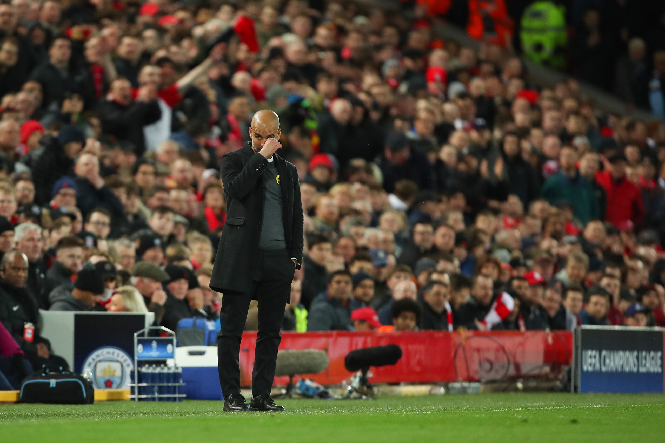 LIVERPOOL, ENGLAND - APRIL 04: A dejected Pep Guardiola the head coach / manager of Manchester City  during the UEFA Champions League Quarter Final Leg One match between Liverpool and Manchester City at Anfield on April 4, 2018 in Liverpool, England. (Pho