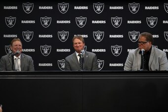 ALAMEDA, CA - JANUARY 09:  (L-R) Oakland Raiders owner Mark Davis, Oakland Raiders new head coach Jon Gruden and Oakland Raiders general manager Reggie McKenzie look on during a news conference at Oakland Raiders headquarters on January 9, 2018 in Alameda