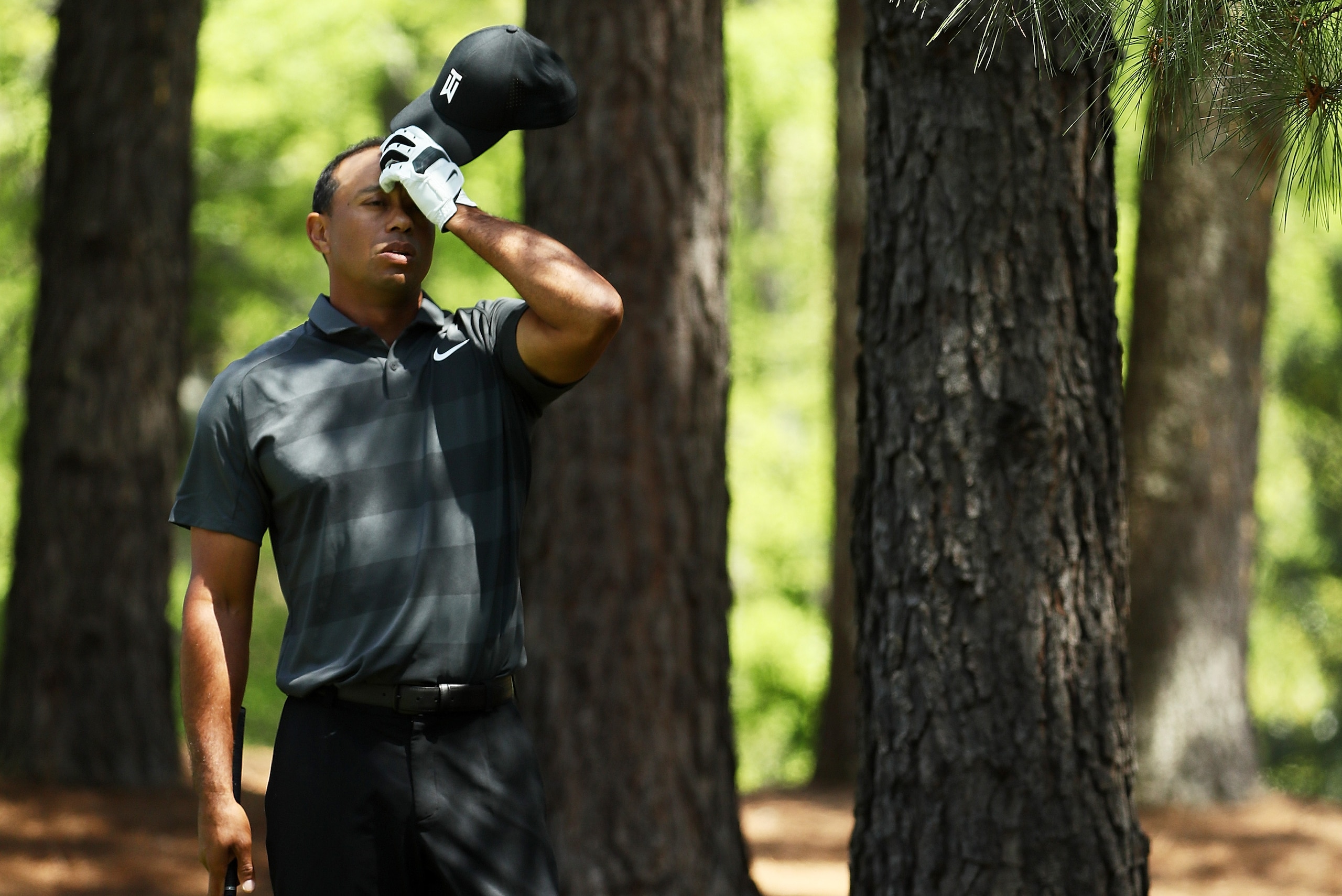 AUGUSTA, GA - APRIL 05:  Tiger Woods of the United States reacts on the eighth hole during the first round of the 2018 Masters Tournament at Augusta National Golf Club on April 5, 2018 in Augusta, Georgia.  (Photo by Jamie Squire/Getty Images)