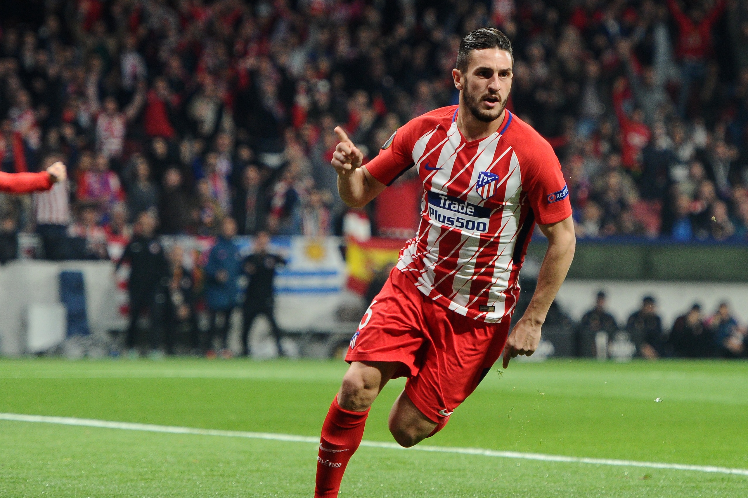 MADRID, SPAIN - APRIL 5: Koke, #6 of Atletico de Madrid celebrates after scoring his team's first goal  during the UEFA Europa League Quarter Final Leg One match between Club Atletico Madrid and Sporting CP at Wanda Metropolitano on April 5, 2018 in Madri