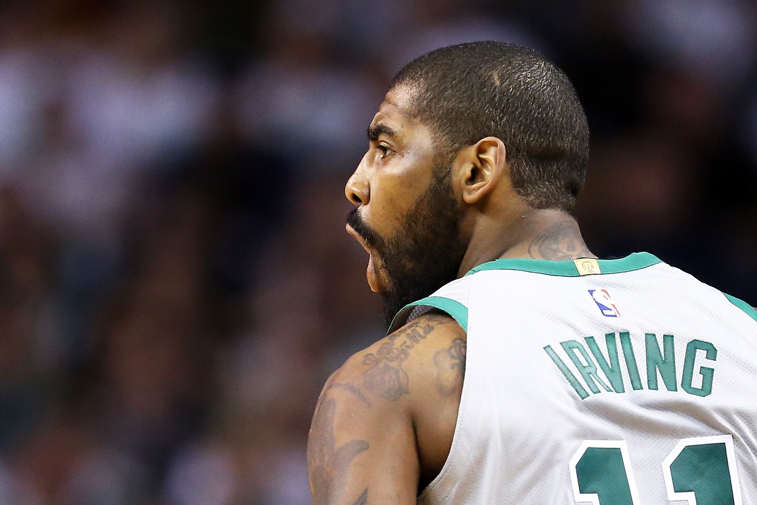 BOSTON, MA - FEBRUARY 11:  Kyrie Irving #11 of the Boston Celtics reacts during a game against the Cleveland Cavaliers at TD Garden on February 11, 2018 in Boston, Massachusetts. NOTE TO USER: User expressly acknowledges and agrees that, by downloading an