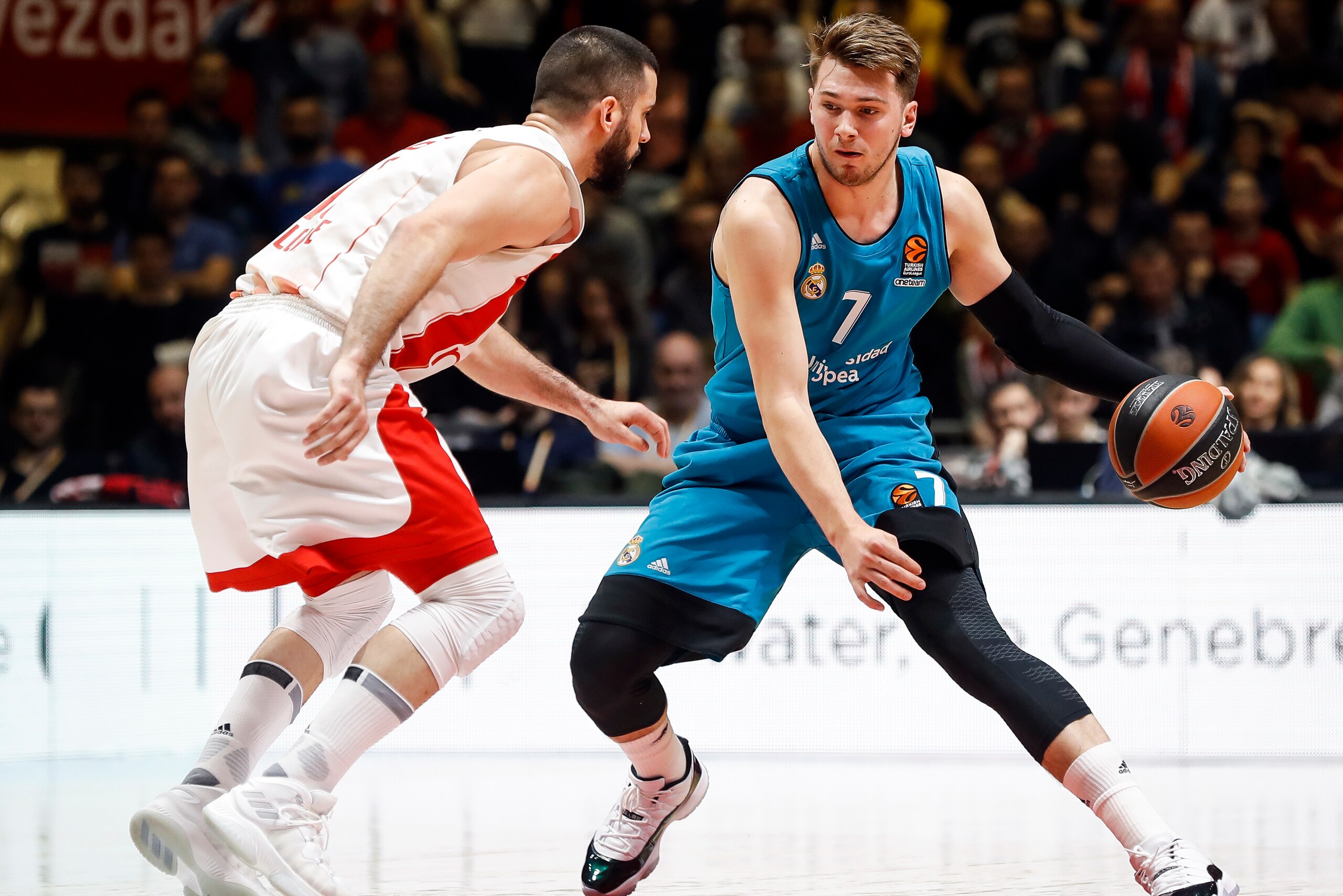 BELGRADE, SERBIA - MARCH 30: Luka Doncic (R) of Real Madrid in action against Branko Lazic (L) of Crvena Zvezda during the 2017/2018 Turkish Airlines EuroLeague Regular Season game between Crvena Zvezda mts Belgrade and Real Madrid at Aleksandar Nikolic H BELGRADE, SERBIA - MARCH 30: Luka Doncic (R) of Real Madrid in action against Branko Lazic (L) of Crvena Zvezda during the 2017/2018 Turkish Airlines EuroLeague Regular Season game between Crvena Zvezda mts Belgrade and Real Madrid at Aleksandar Nikolic H