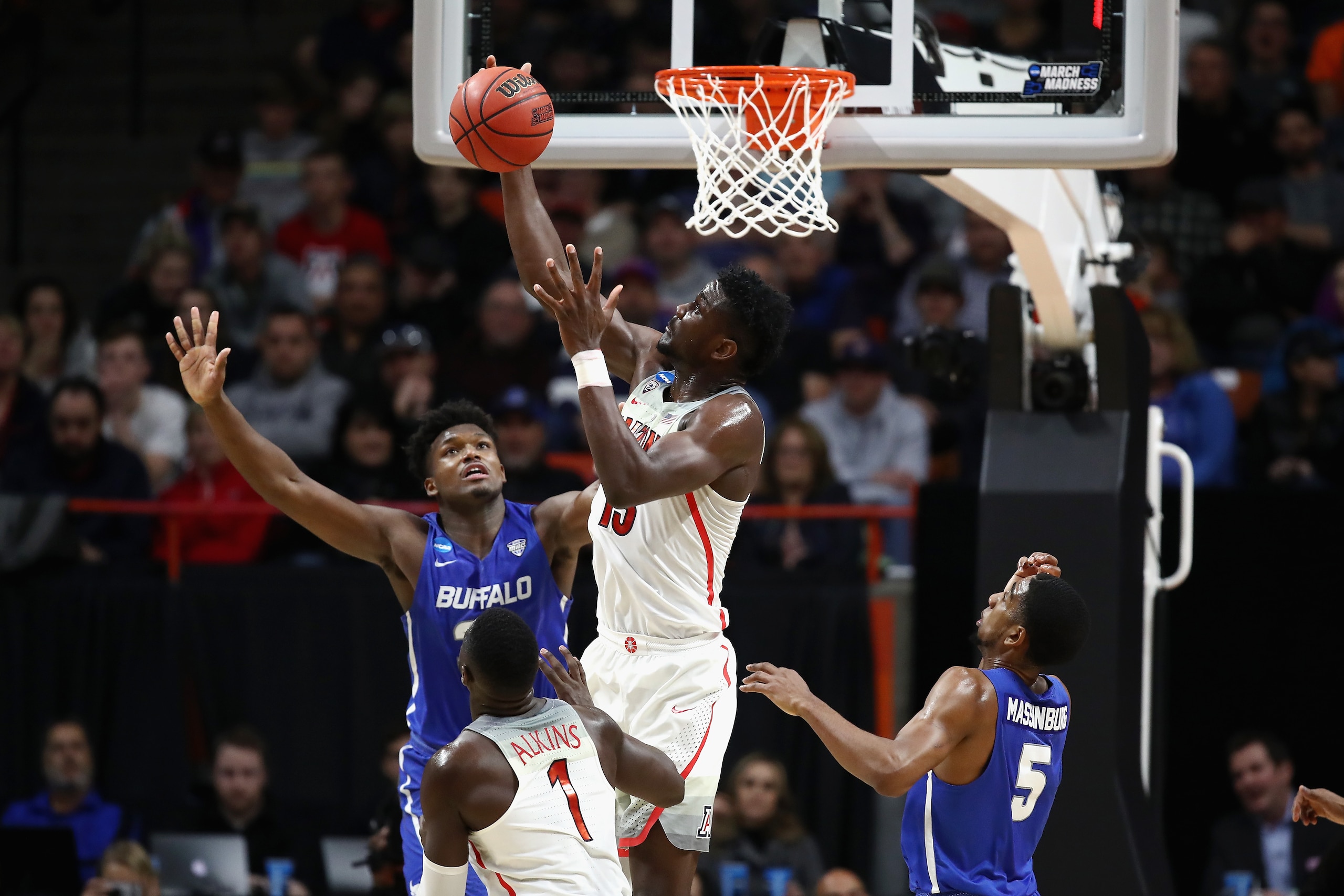 BOISE, ID - MARCH 15: Deandre Ayton #13 of the Arizona Wildcats battles for a rebound in the second half against the Buffalo Bulls during the first round of the 2018 NCAA Men's Basketball Tournament at Taco Bell Arena on March 15, 2018 in Boise, Idaho. BOISE, ID - MARCH 15: Deandre Ayton #13 of the Arizona Wildcats battles for a rebound in the second half against the Buffalo Bulls during the first round of the 2018 NCAA Men's Basketball Tournament at Taco Bell Arena on March 15, 2018 in Boise, Idaho.