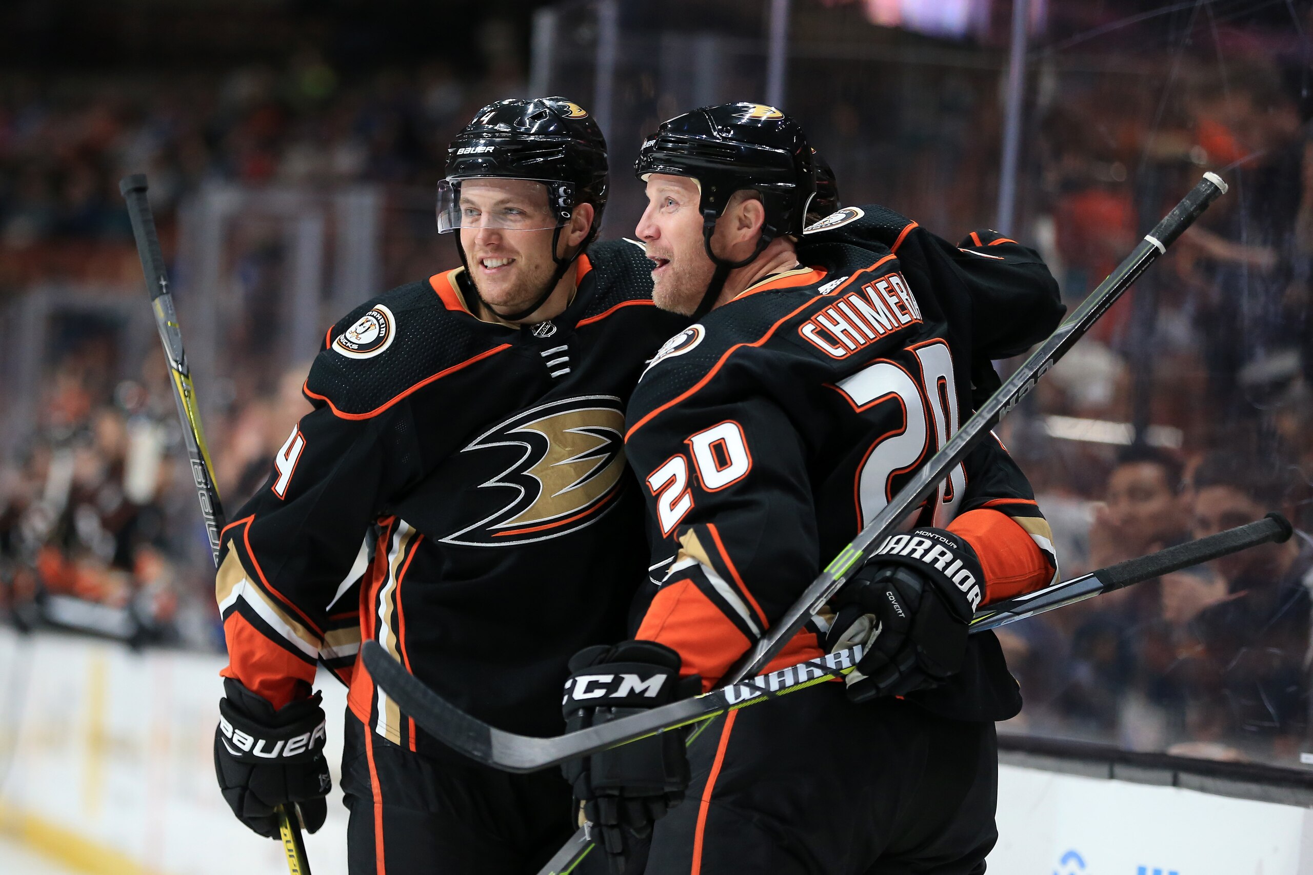 ANAHEIM, CA - MARCH 14:  Cam Fowler #4 and Jason Chimera #20 celebrate a goal by Brandon Montour #26 of the Anaheim Ducks during the first period of a game  at Honda Center on March 14, 2018 in Anaheim, California.  (Photo by Sean M. Haffey/Getty Images)