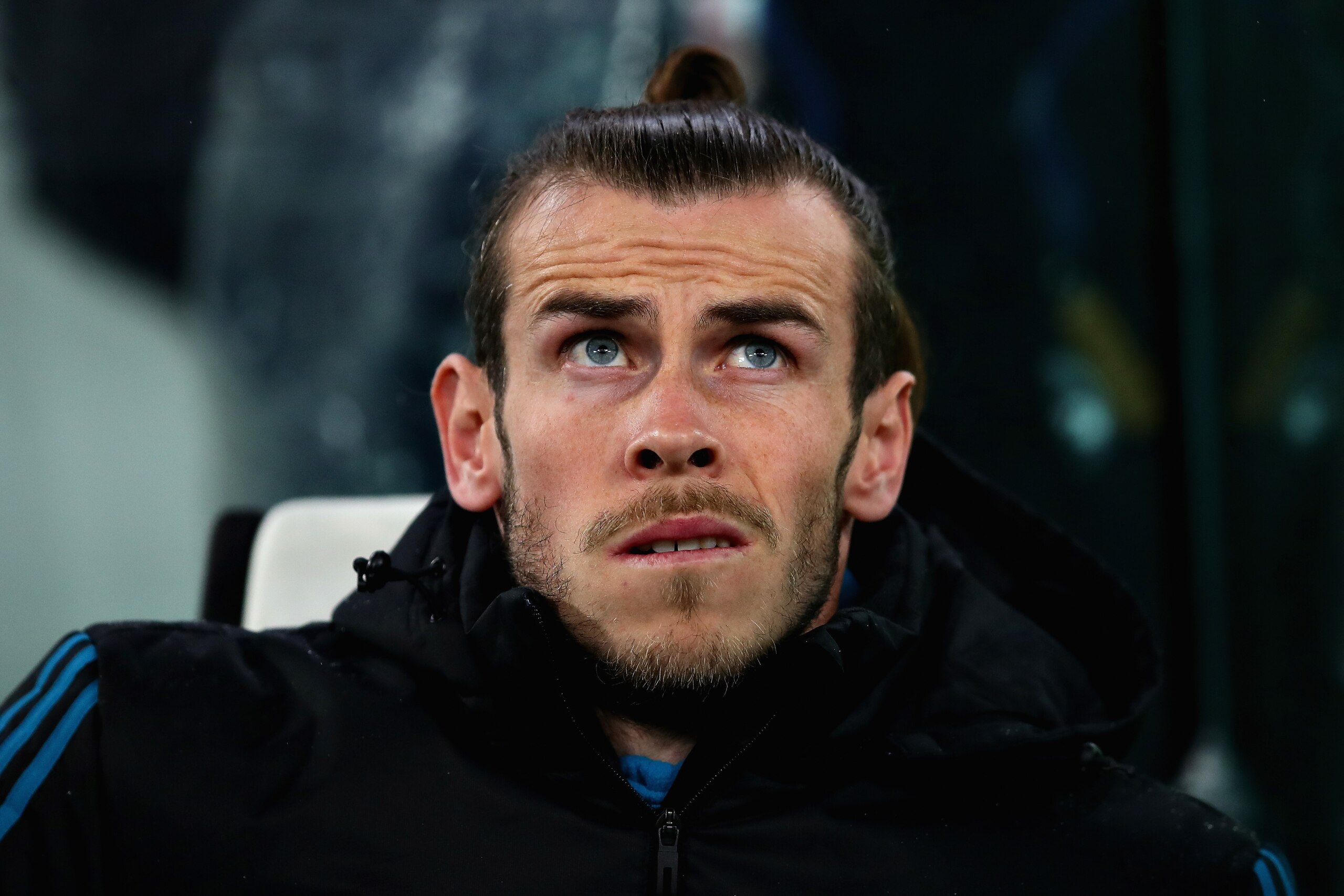 TURIN, ITALY - APRIL 03:  Gareth Bale of Real Madrid looks on from the substitutes bench during the UEFA Champions League Quarter Final, first leg match between Juventus and Real Madrid at Juventus Stadium on April 3, 2018 in Turin, Italy.  (Photo by Chri