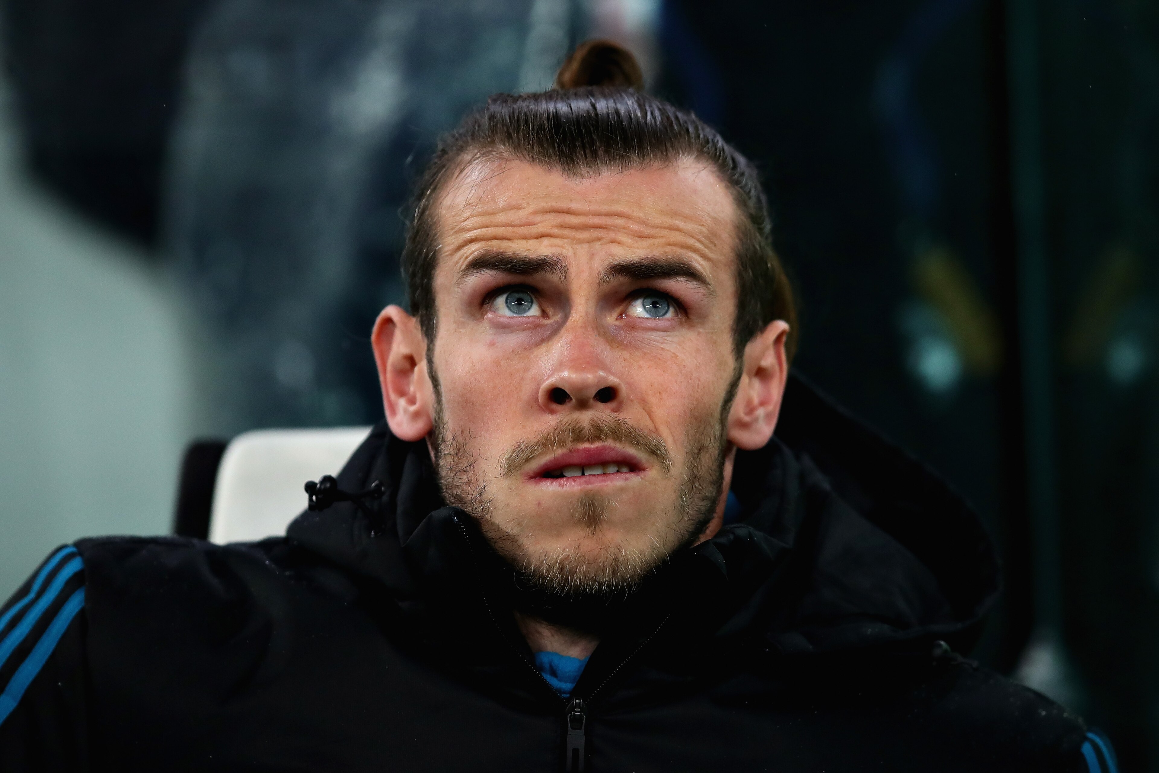 TURIN, ITALY - APRIL 03:  Gareth Bale of Real Madrid looks on from the substitutes bench during the UEFA Champions League Quarter Final, first leg match between Juventus and Real Madrid at Juventus Stadium on April 3, 2018 in Turin, Italy.  (Photo by Chri