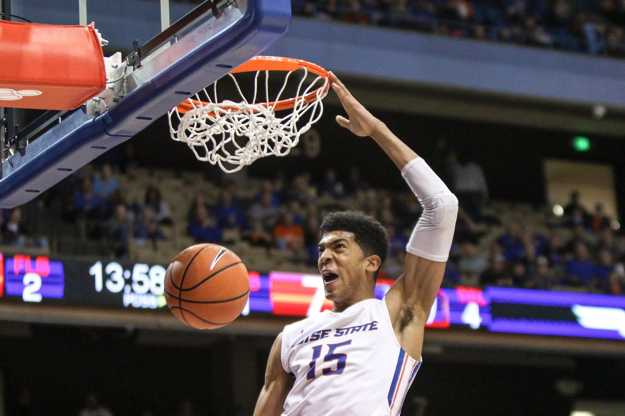 BOISE, ID - JANUARY 24: Guard Chandler Hutchison #15 of the Boise State Broncos celebrates after a dunk during first half action against the San Jose State Spartans on January 24, 2018 at Taco Bell Arena in Boise, Idaho. (Photo by Loren Orr/Getty Images)