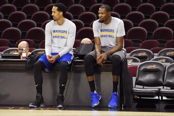 CLEVELAND, OH - JUNE 06:  Shaun Livingston #34 and Kevin Durant #35 of the Golden State Warriors looks on during practice and media availability as part of the 2017 NBA Finals on June 06, 2017 at Quicken Loans Arena in Cleveland, Ohio. NOTE TO USER: User 