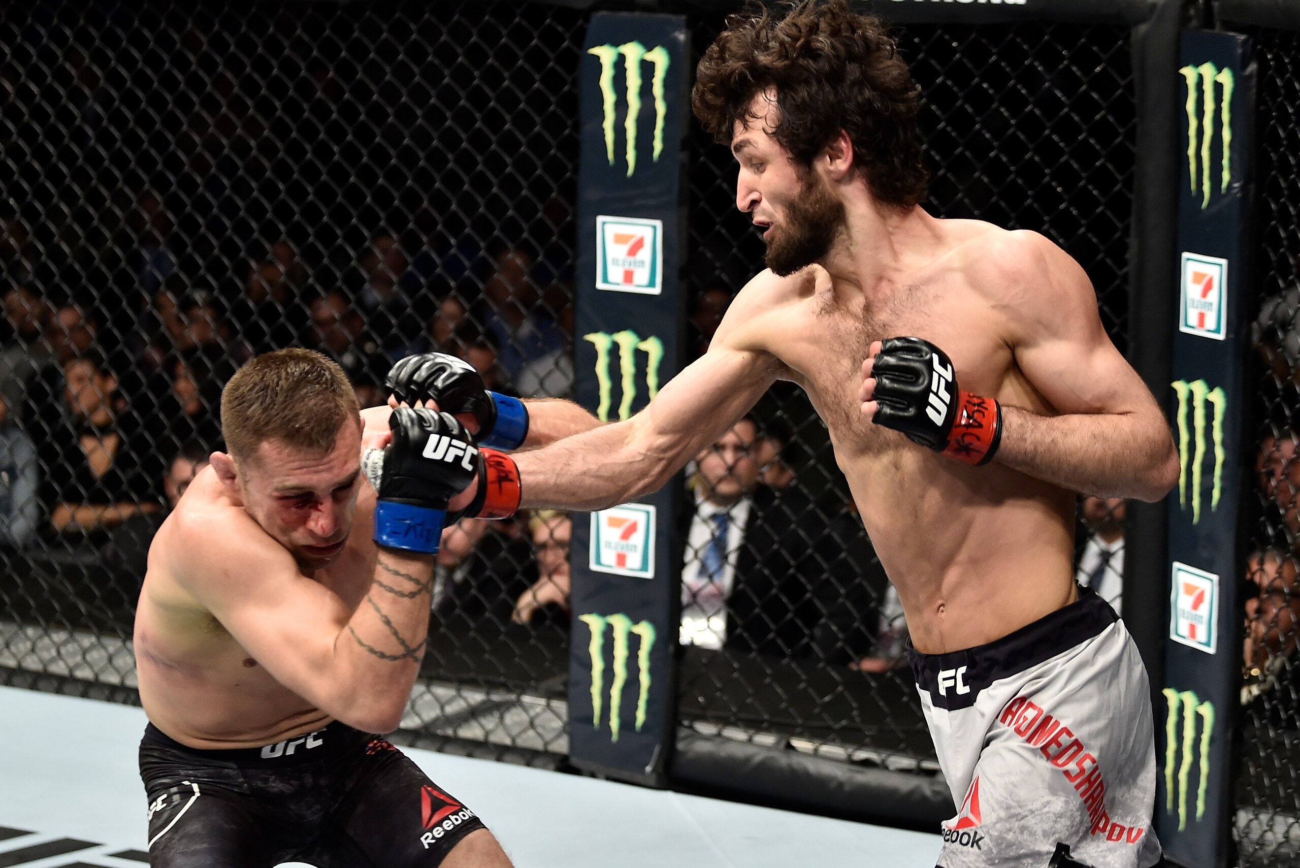 BROOKLYN, NEW YORK - APRIL 07: (R-L) Zabit Magomedsharipov of Russia punches Kyle Bochniak in their featherweight bout during the UFC 223 event inside Barclays Center on April 7, 2018 in Brooklyn, New York. (Photo by Jeff Bottari/Zuffa LLC/Zuffa LLC via BROOKLYN, NEW YORK - APRIL 07: (R-L) Zabit Magomedsharipov of Russia punches Kyle Bochniak in their featherweight bout during the UFC 223 event inside Barclays Center on April 7, 2018 in Brooklyn, New York. (Photo by Jeff Bottari/Zuffa LLC/Zuffa LLC via
